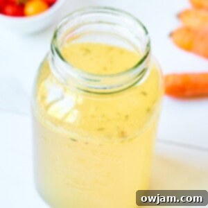 Effortless Homemade Beef Bone Broth 6 Easy Beef Bone Broth in a glass jar, perfectly gelatinous, ready for use or storage.
