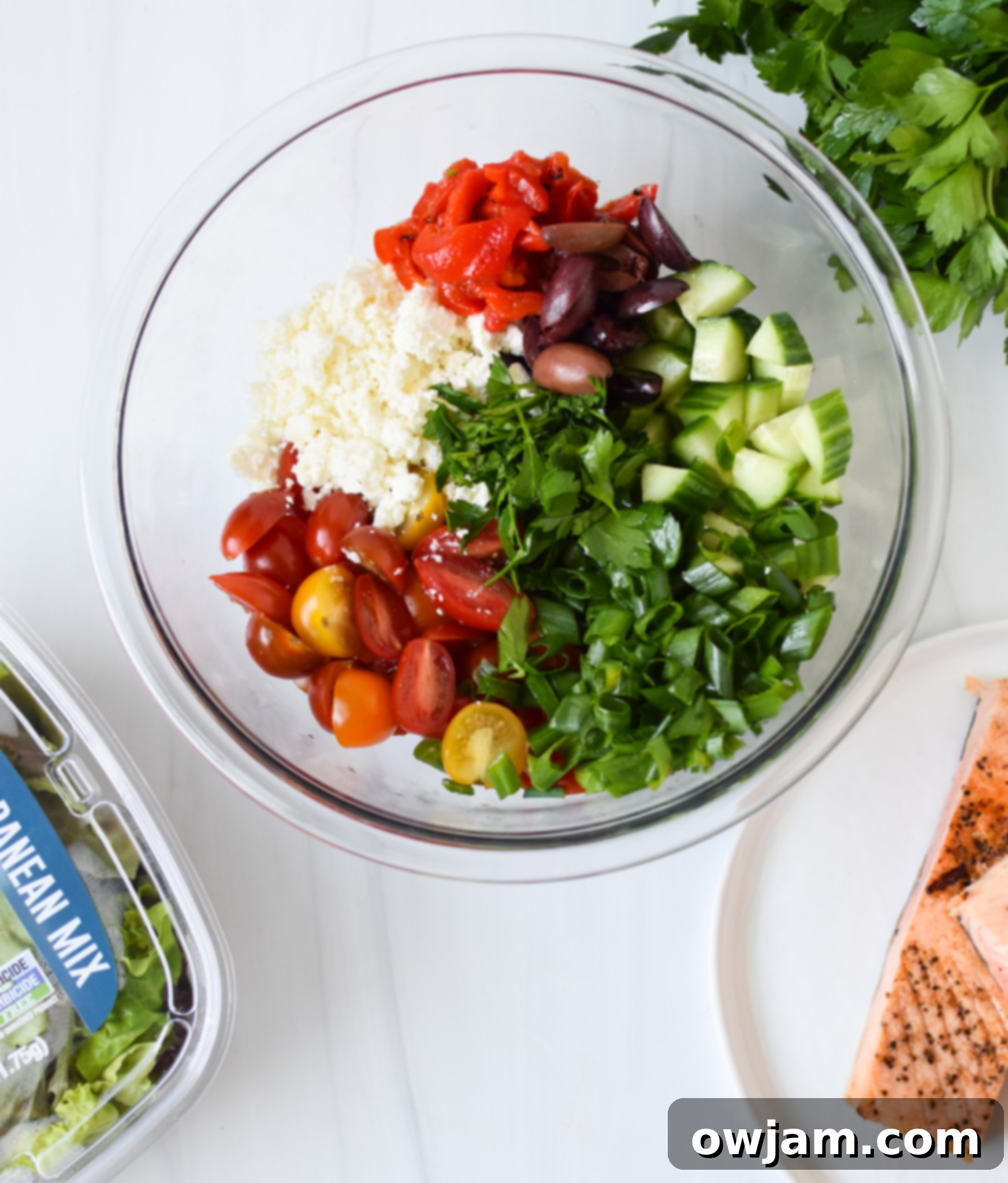 Mediterranean Salmon Delight 4 Mediterranean Salmon Bowl chopped in a bowl.