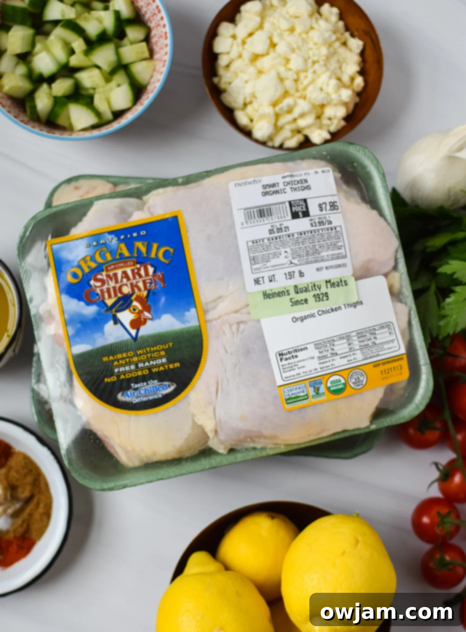 Air Fryer Mediterranean Chicken Thighs ingredients laid out on a table.