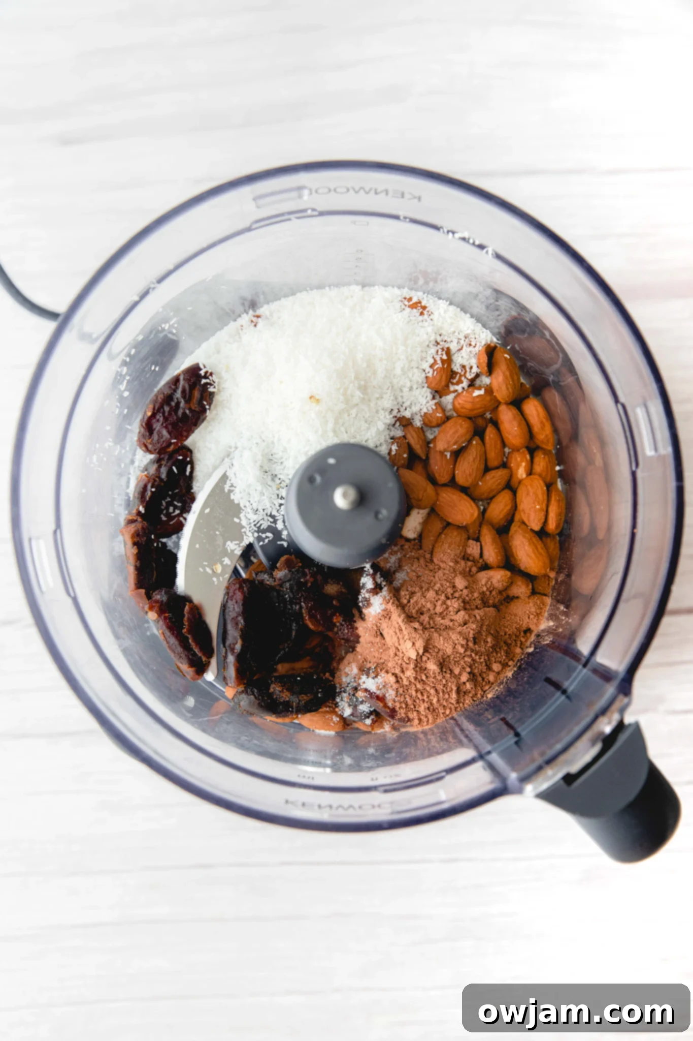 No-Bake Date Energy Bites 5 All ingredients for Easy Date Protein Balls being blended in a food processor.