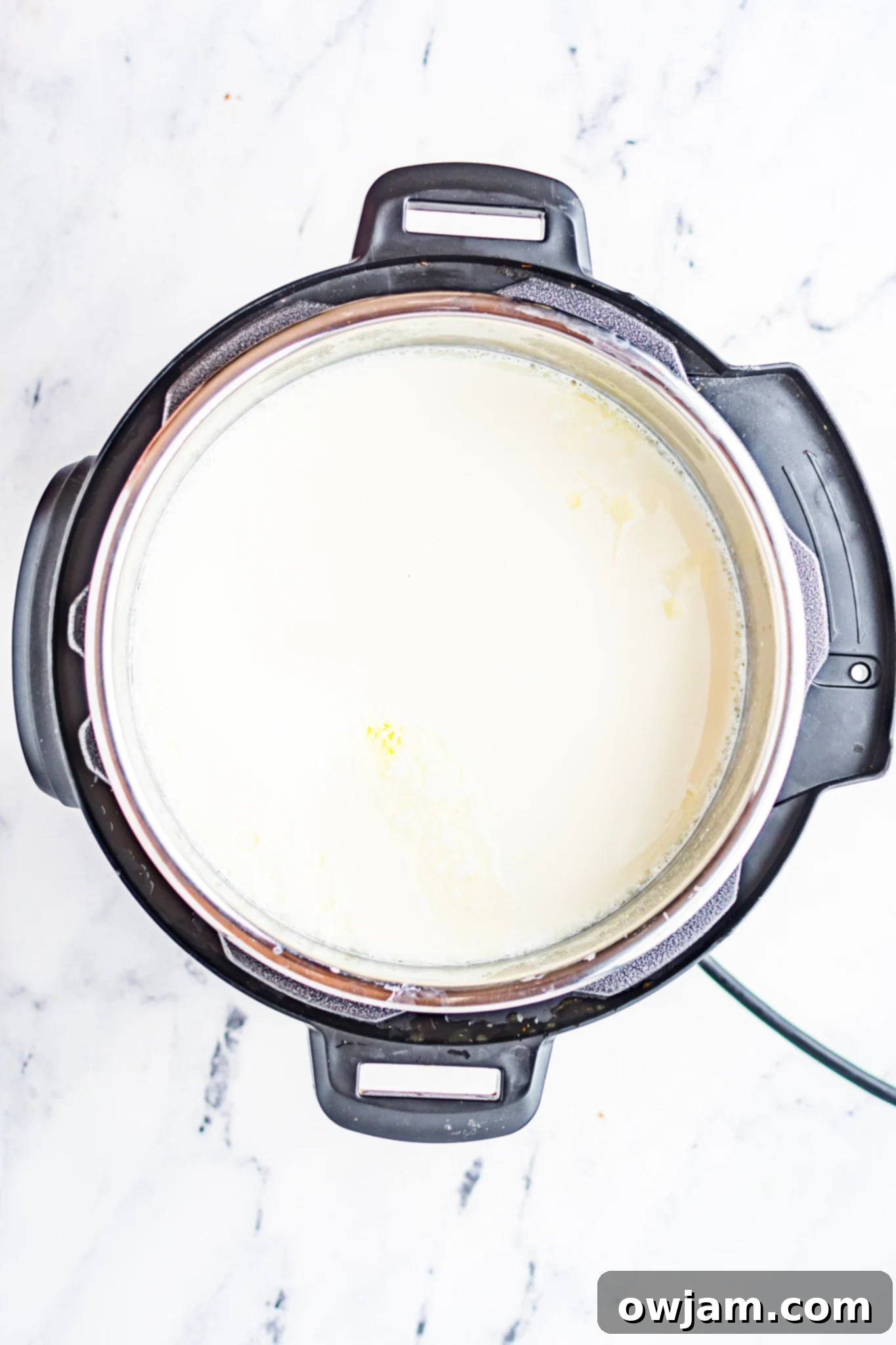 Easy Instant Pot Yogurt 6 The Instant Pot displaying the 'Yogurt' setting, illustrating the incubation process for homemade yogurt.