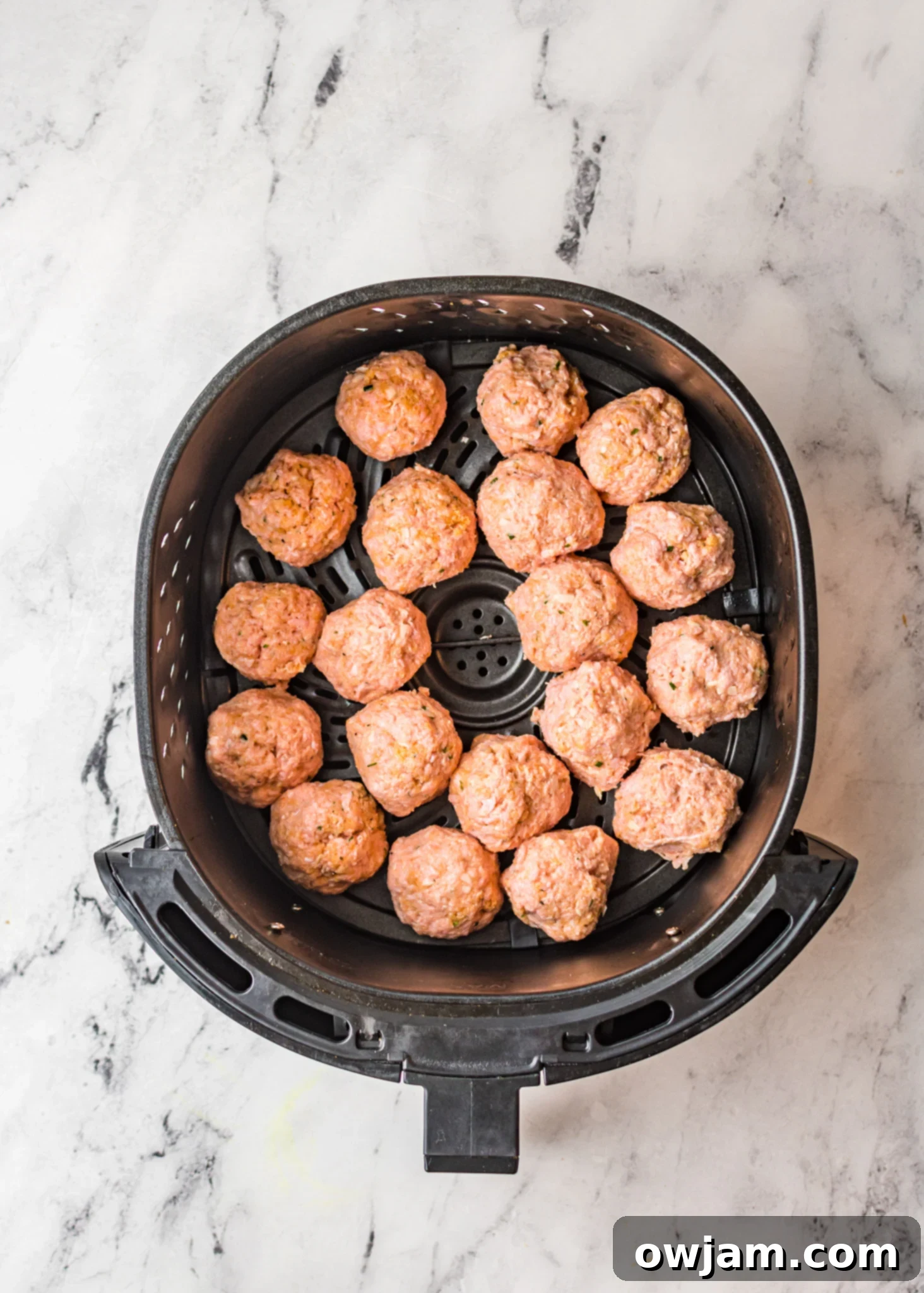 Air Fryer Meatballs in an air fryer.