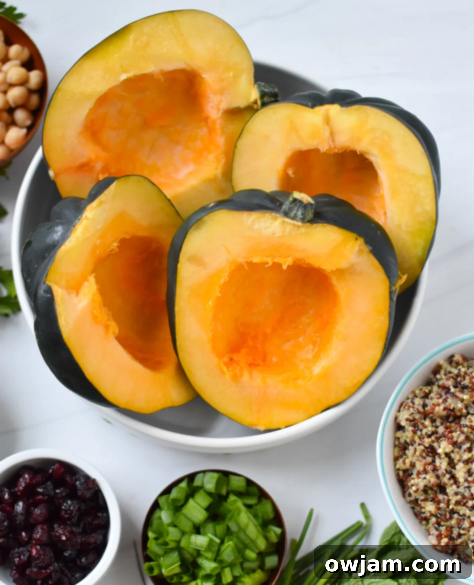Sun-Drenched Stuffed Acorn Squash 5 Mediterranean Stuffed Acorn Squash cut in a bowl.