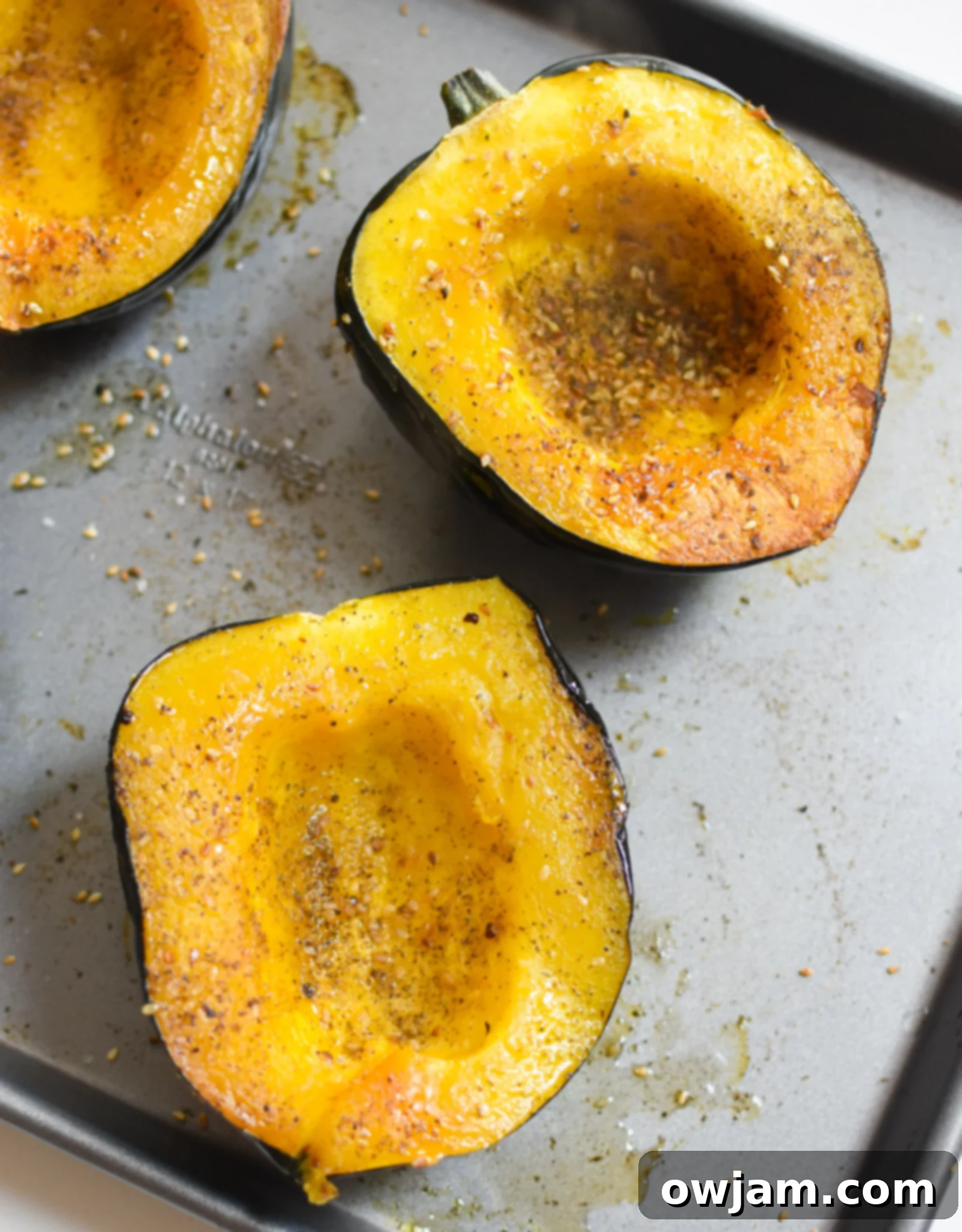 Sun-Drenched Stuffed Acorn Squash 6 Mediterranean Stuffed Acorn Squash with salt and za'atar sprinkled on squash.