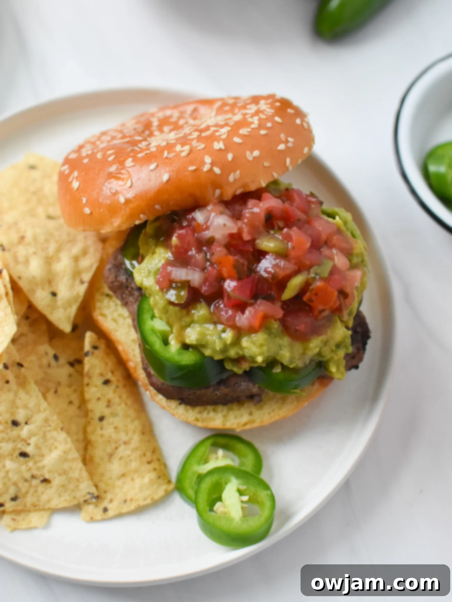 Tex Mex Burger 3 Tex Mex Burger topped with fresh jalapeños.