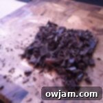 Close-up of dark chocolate chunks, perfect for melting into a smooth, rich layer for homemade peppermint bark.