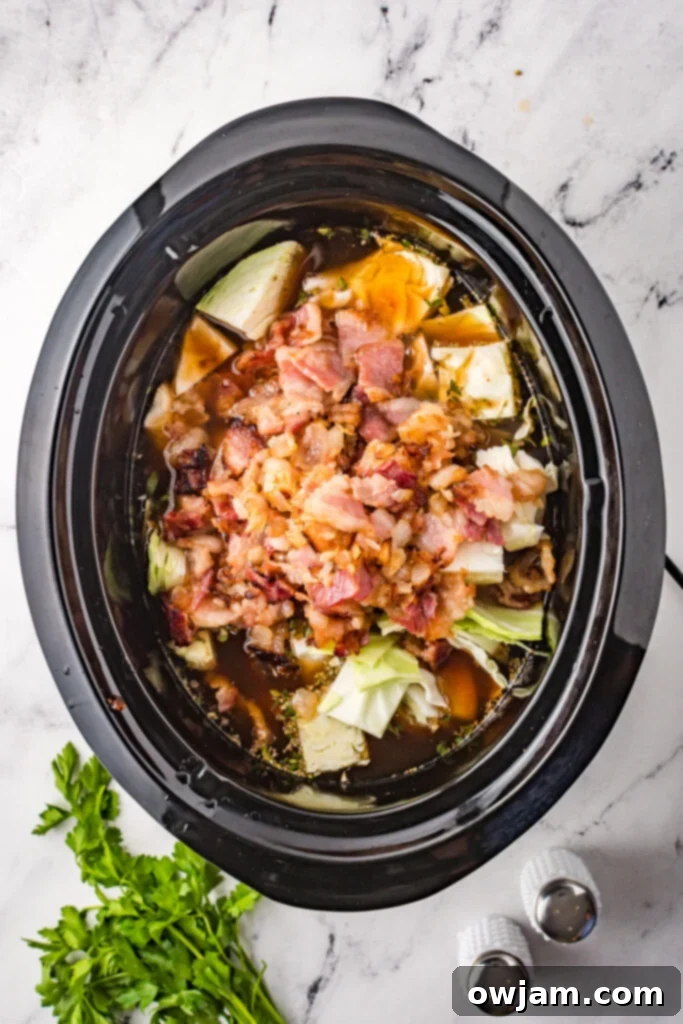 Deconstructed Cabbage Roll Soup 5 Ingredients for Cabbage Roll Soup being added to a slow cooker.
