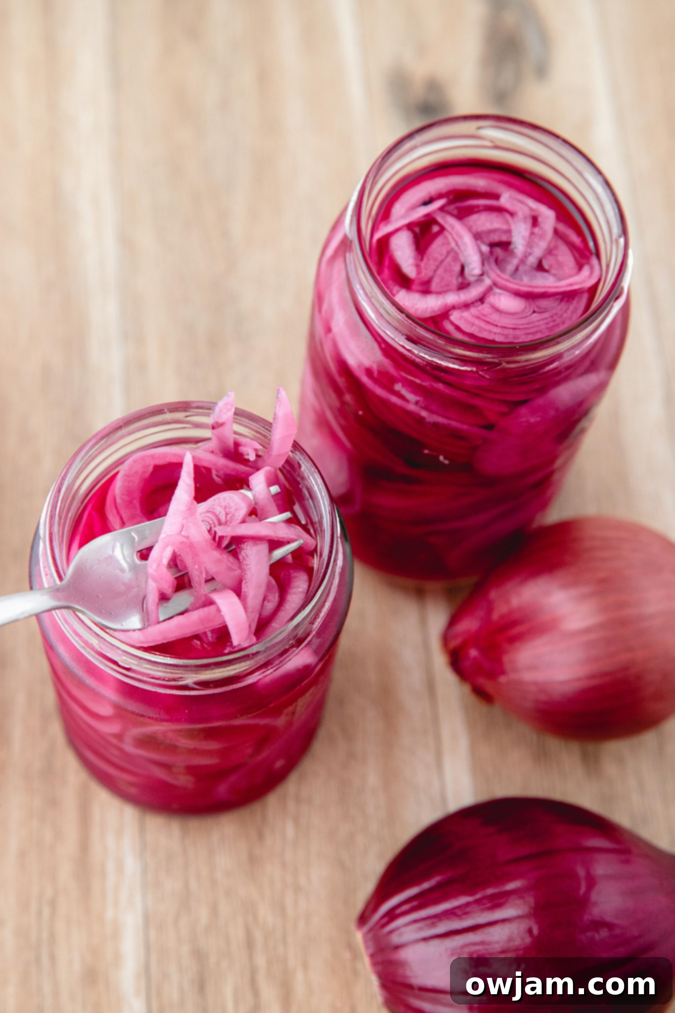Quick Pickled Red Onions with fork.
