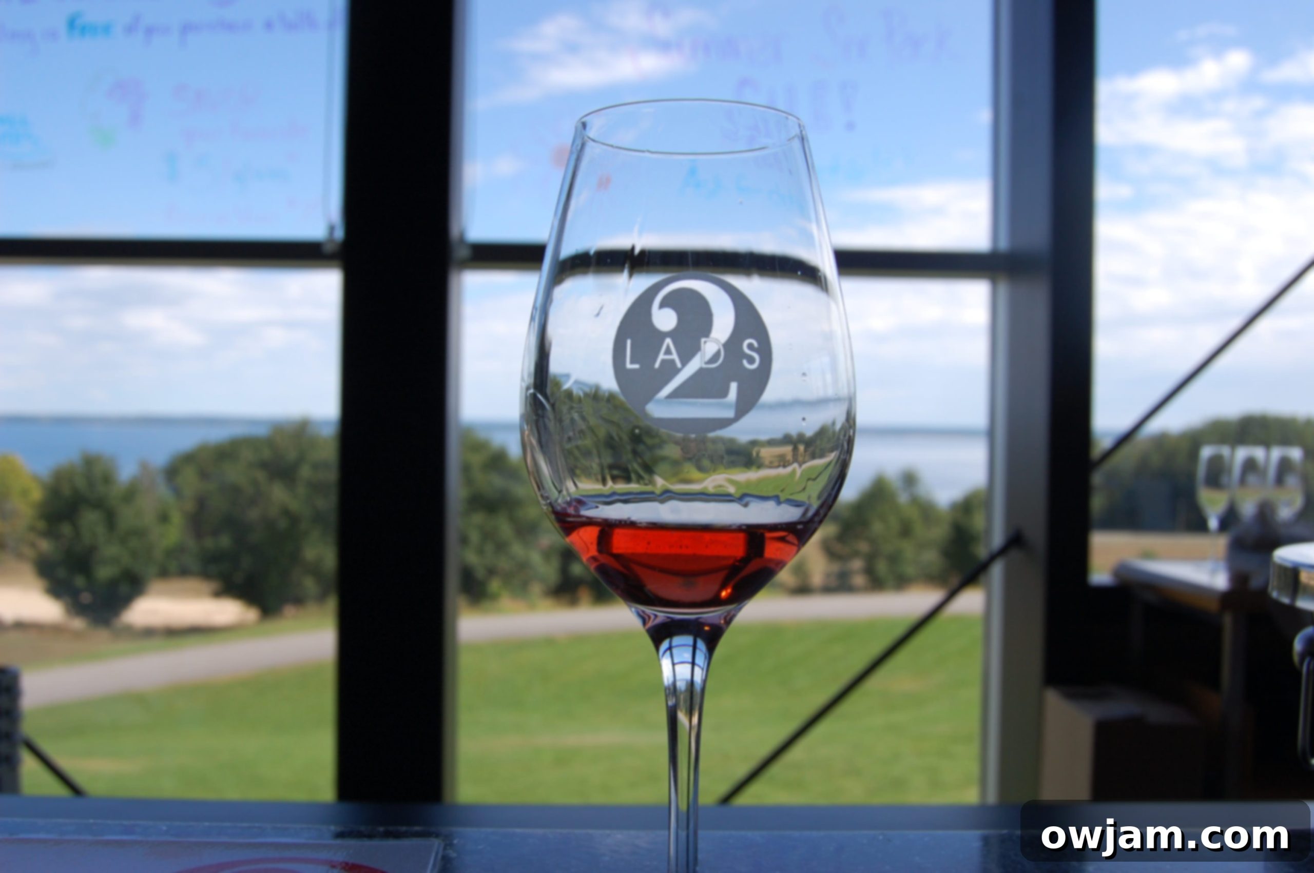 Modern tasting room at 2 Lads Winery with panoramic window views