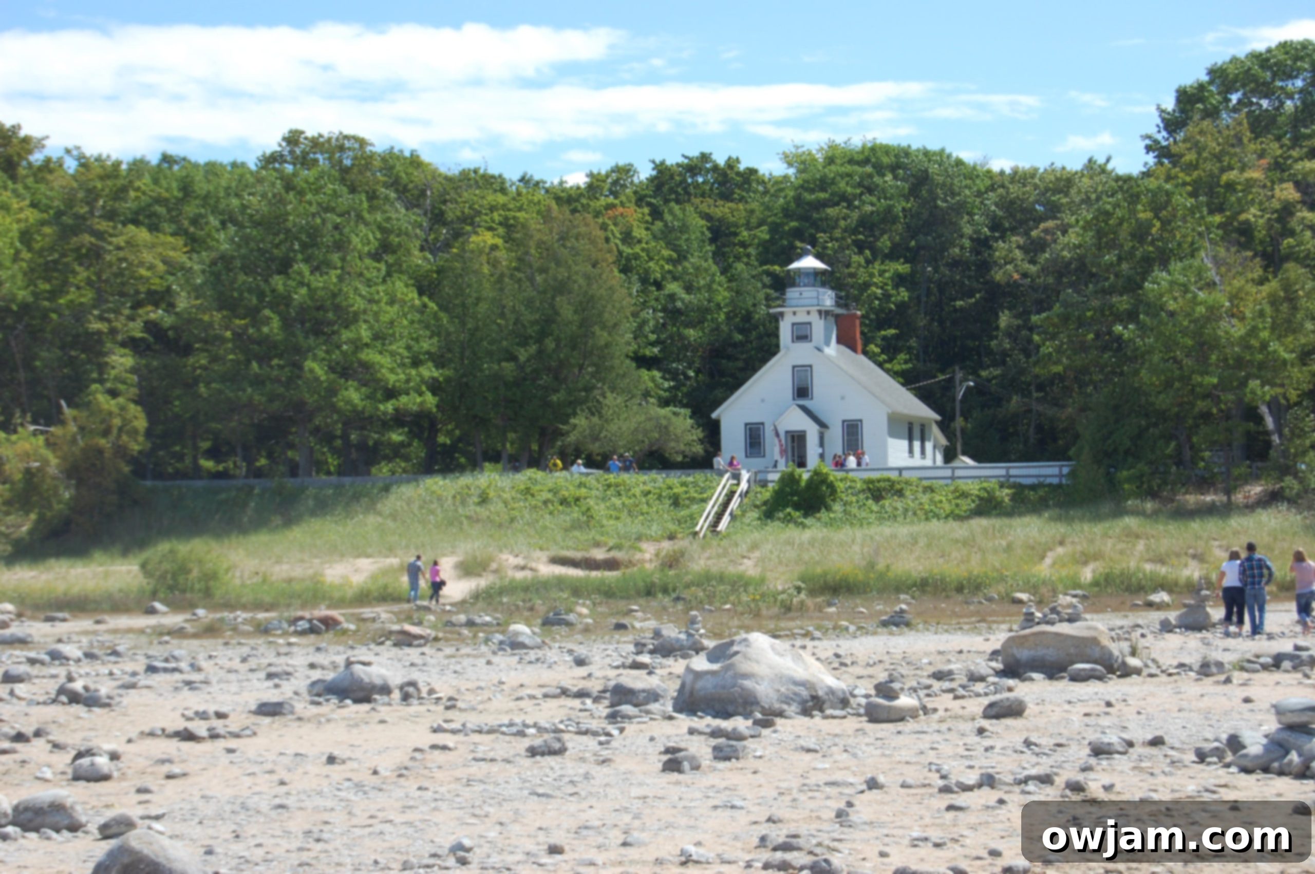 Lake Michigan shoreline near Mission Point Lighthouse, with calm waters