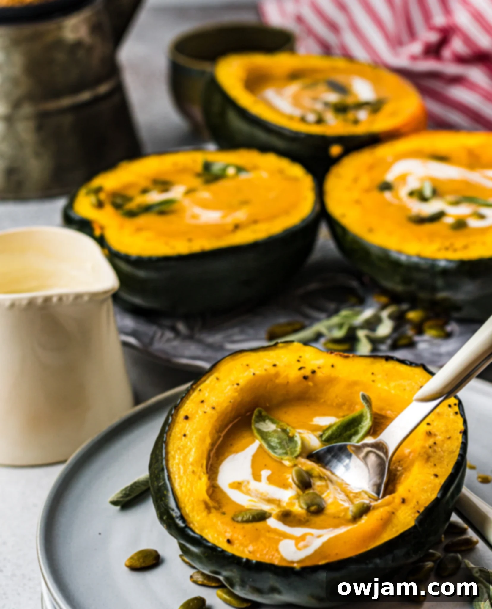 Golden Butternut Sweet Potato Comfort 11 Close-up of creamy Butternut Squash and Sweet Potato Soup with a spoon.