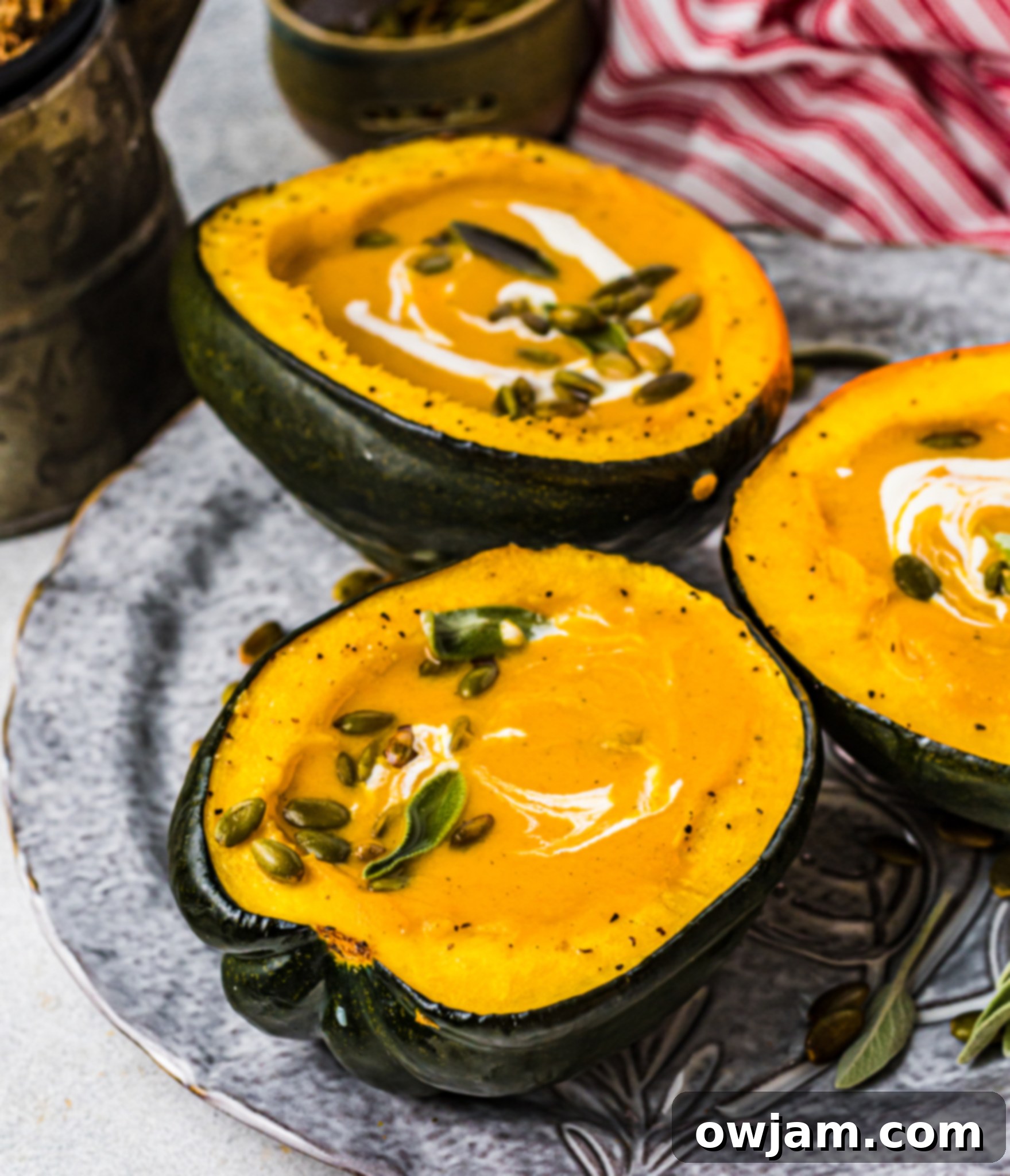 Golden Butternut Sweet Potato Comfort 4 A bowl of creamy Butternut Squash and Sweet Potato Soup garnished with fresh herbs.