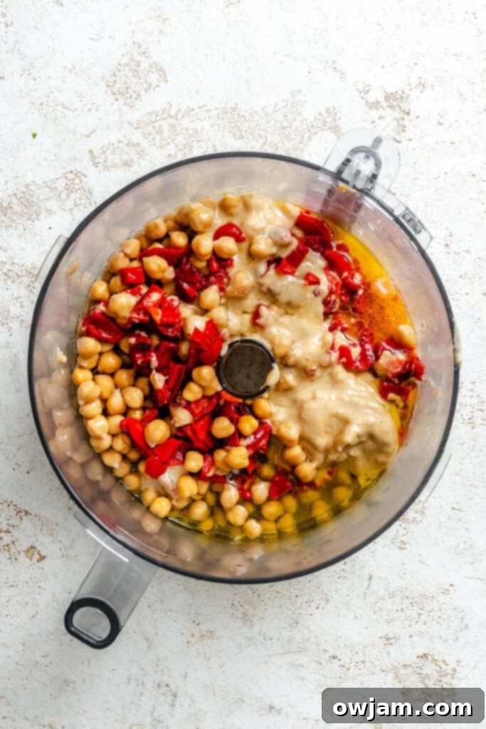 Smoky Red Pepper Hummus 5 Roasted Red Pepper Hummus ingredients in blender