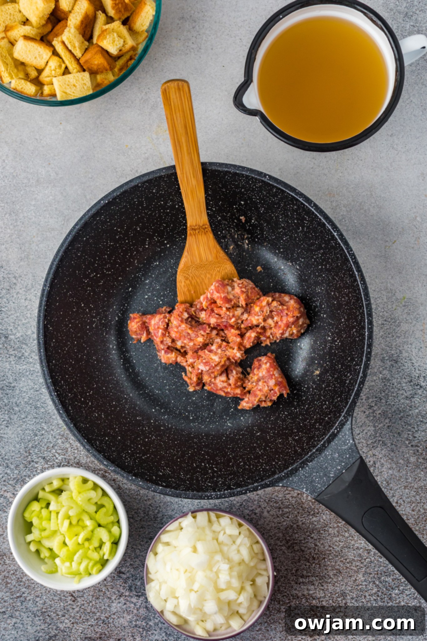 Autumn Butternut Dressing 6 Italian sausage browning in a large skillet, ready to be combined with other stuffing ingredients.
