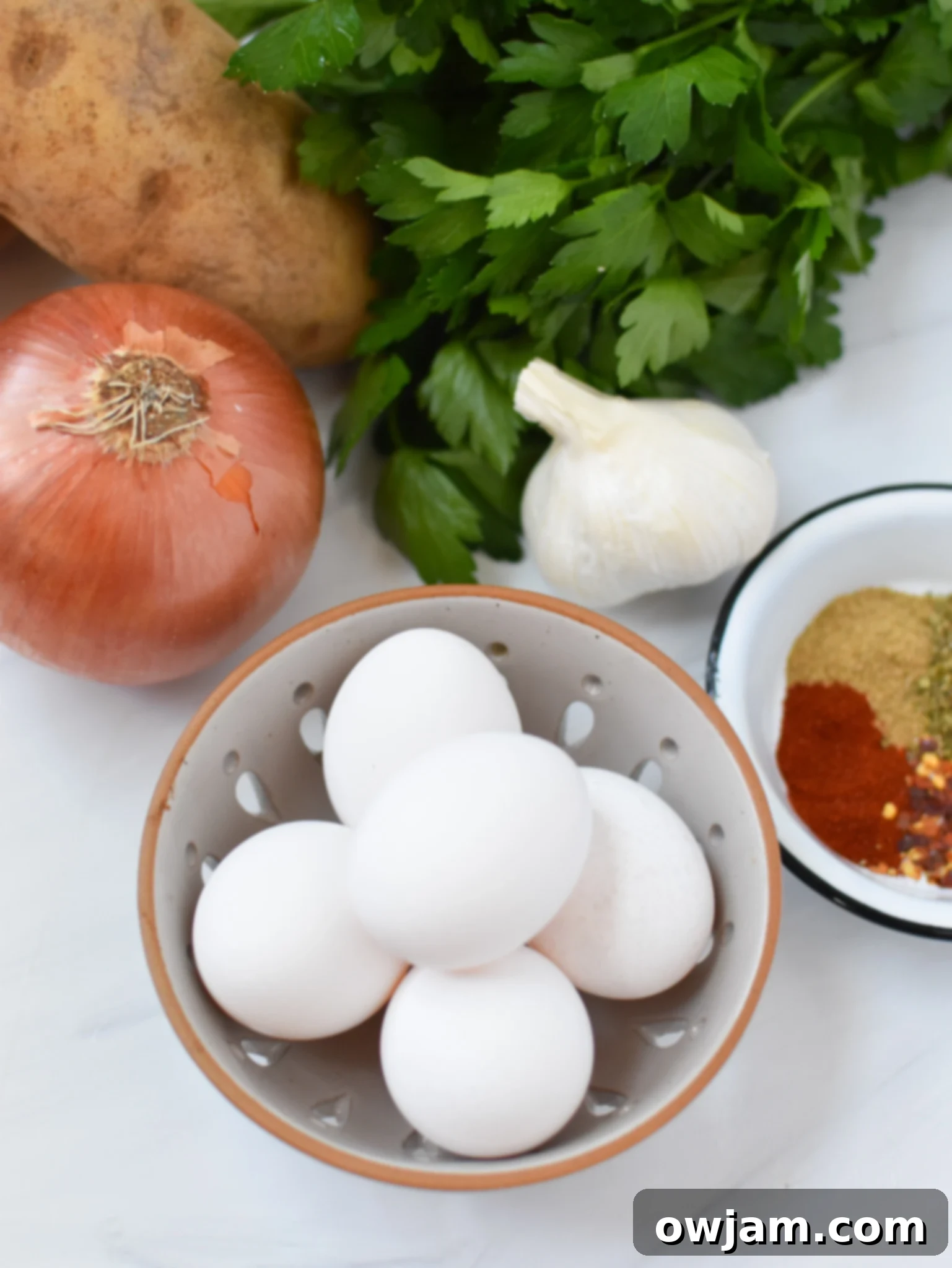 Savory Lebanese Potato and Egg Dish 4 Close-up of fresh ingredients for Lebanese Potato and Egg Recipe.