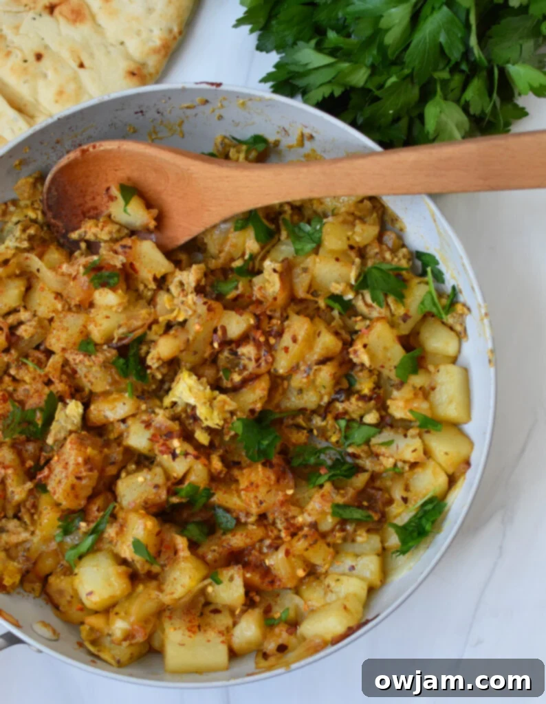 Savory Lebanese Potato and Egg Dish 6 Lebanese Potato and Egg in a skillet, ready to be served.
