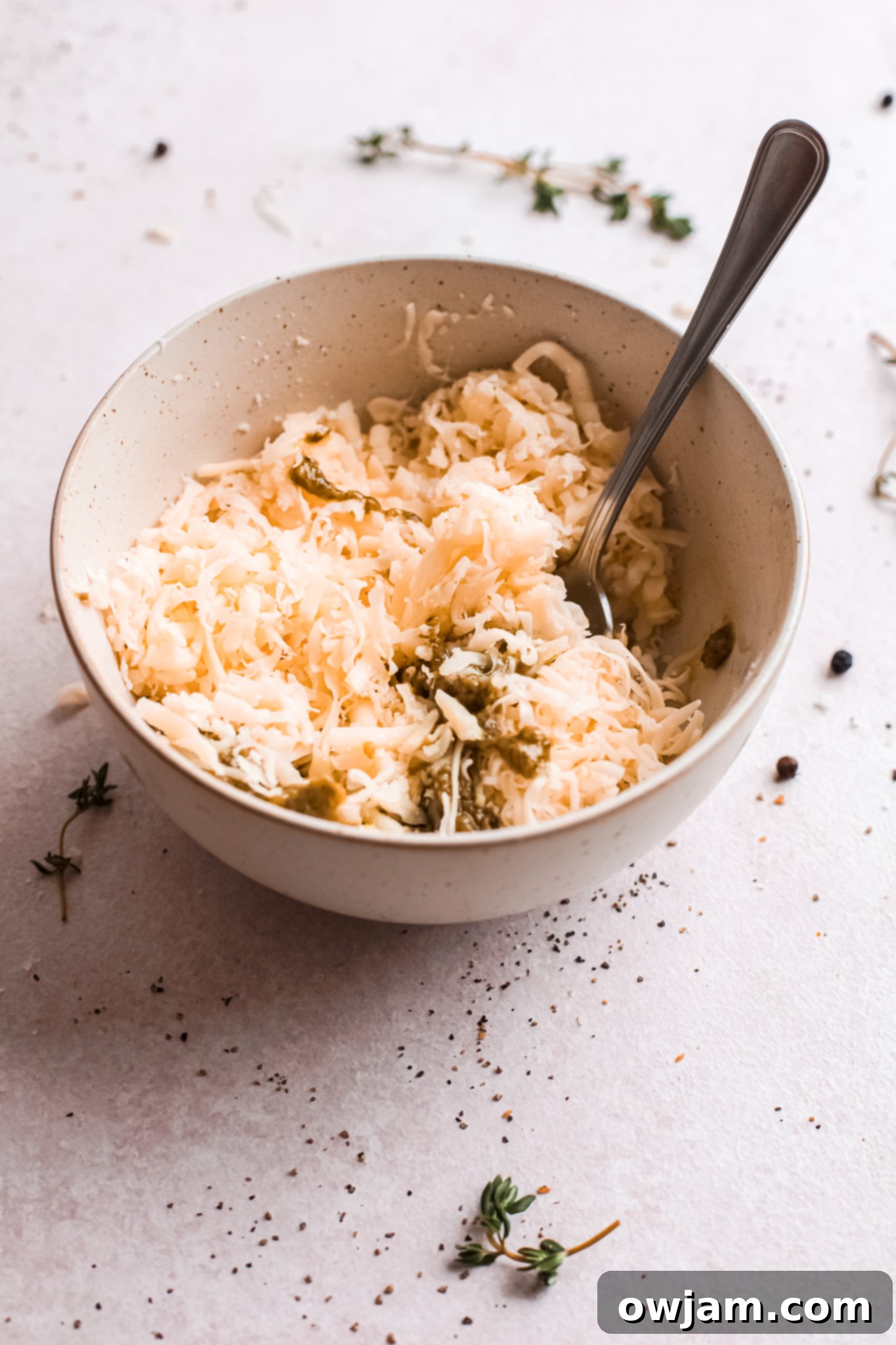 Mixed ingredients for Baked Cheesy Spaghetti Squash Recipe in a bowl.