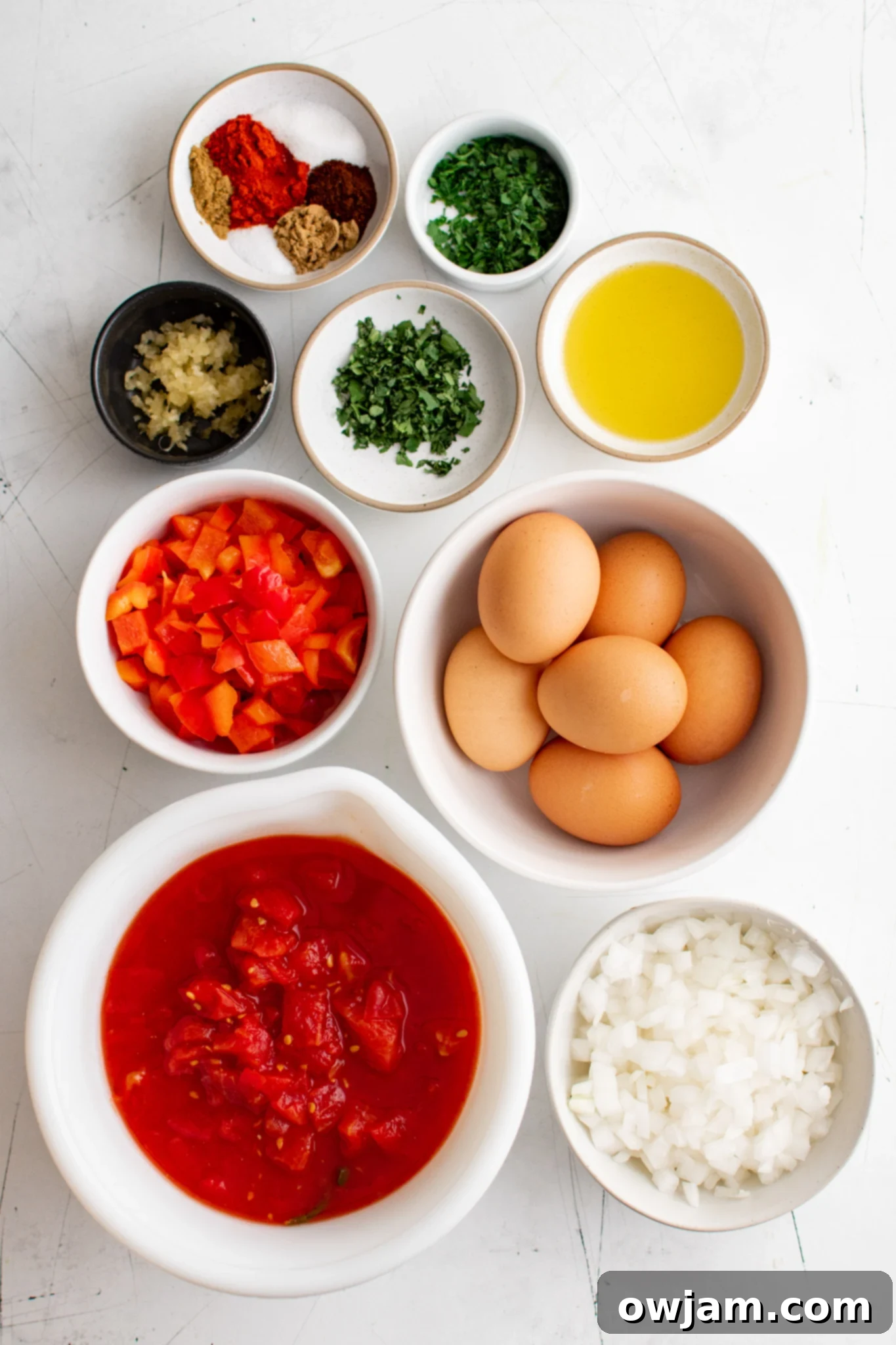 Effortless Shakshuka 5 Fresh ingredients laid out for making Easy Shakshuka.