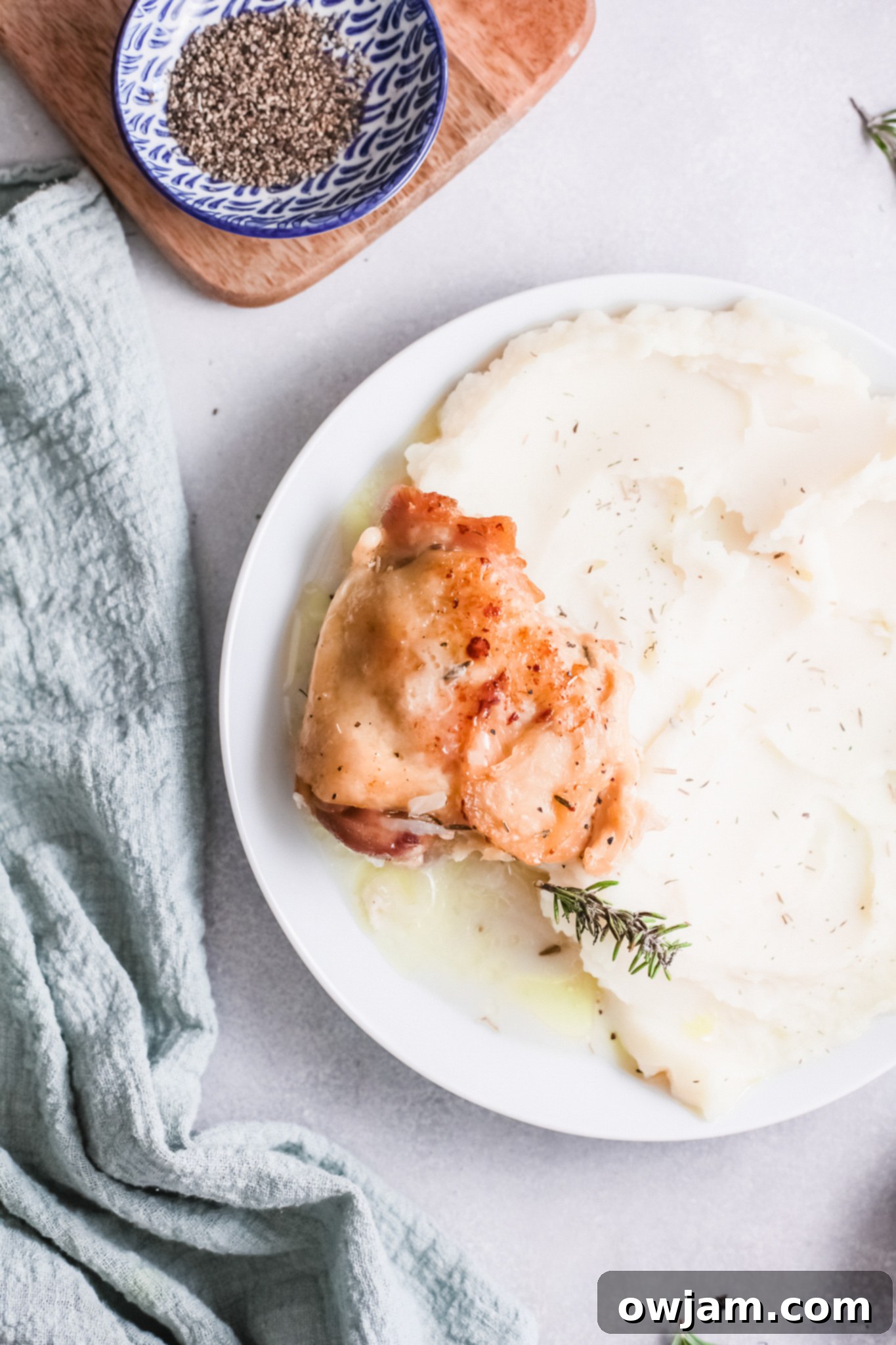 Delicious Instant Pot Creamy Rosemary Chicken 3 Instant Pot Creamy Rosemary Chicken with fresh rosemary sprigs.