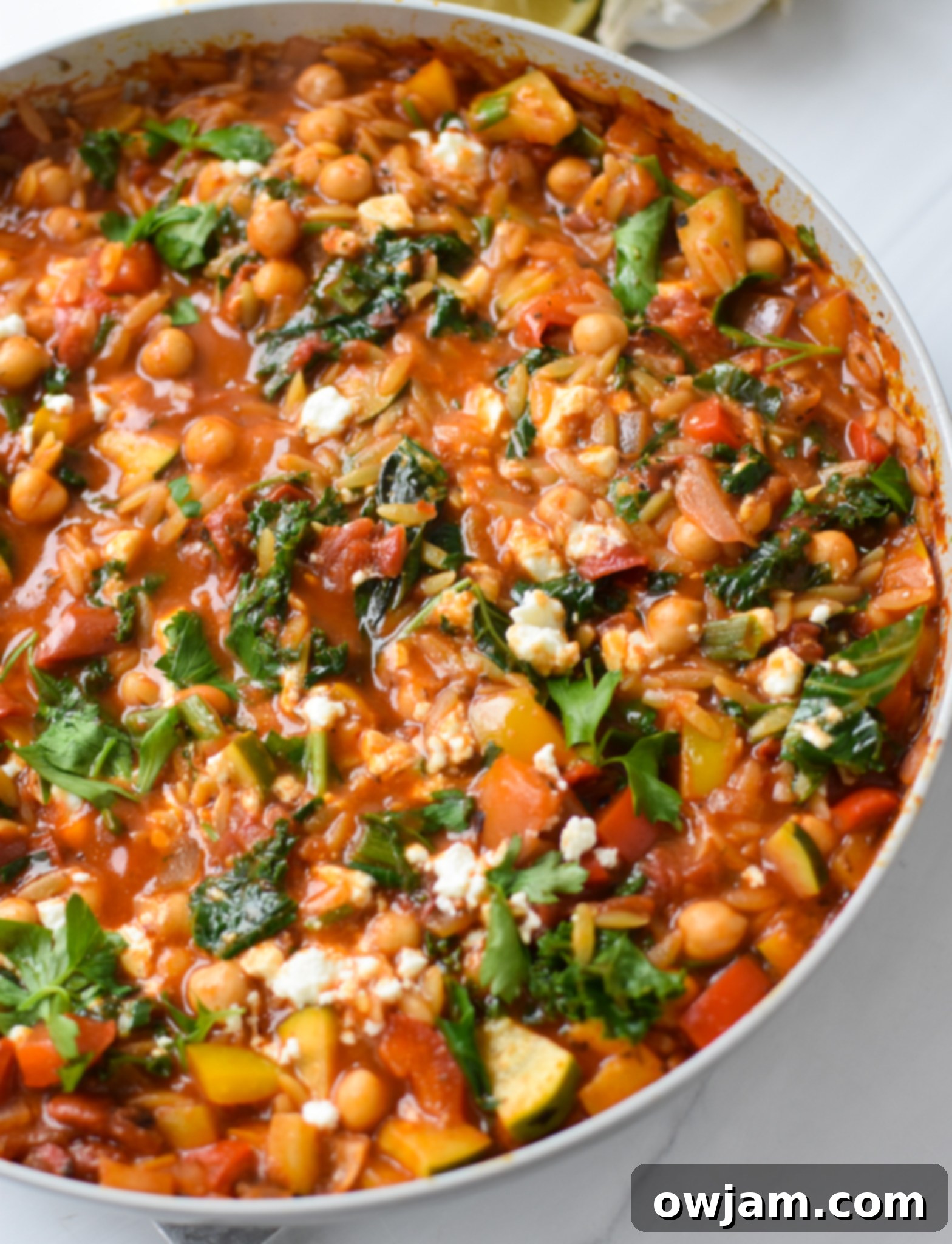 Mediterranean Orzo Pasta in a skillet, ready to be served.