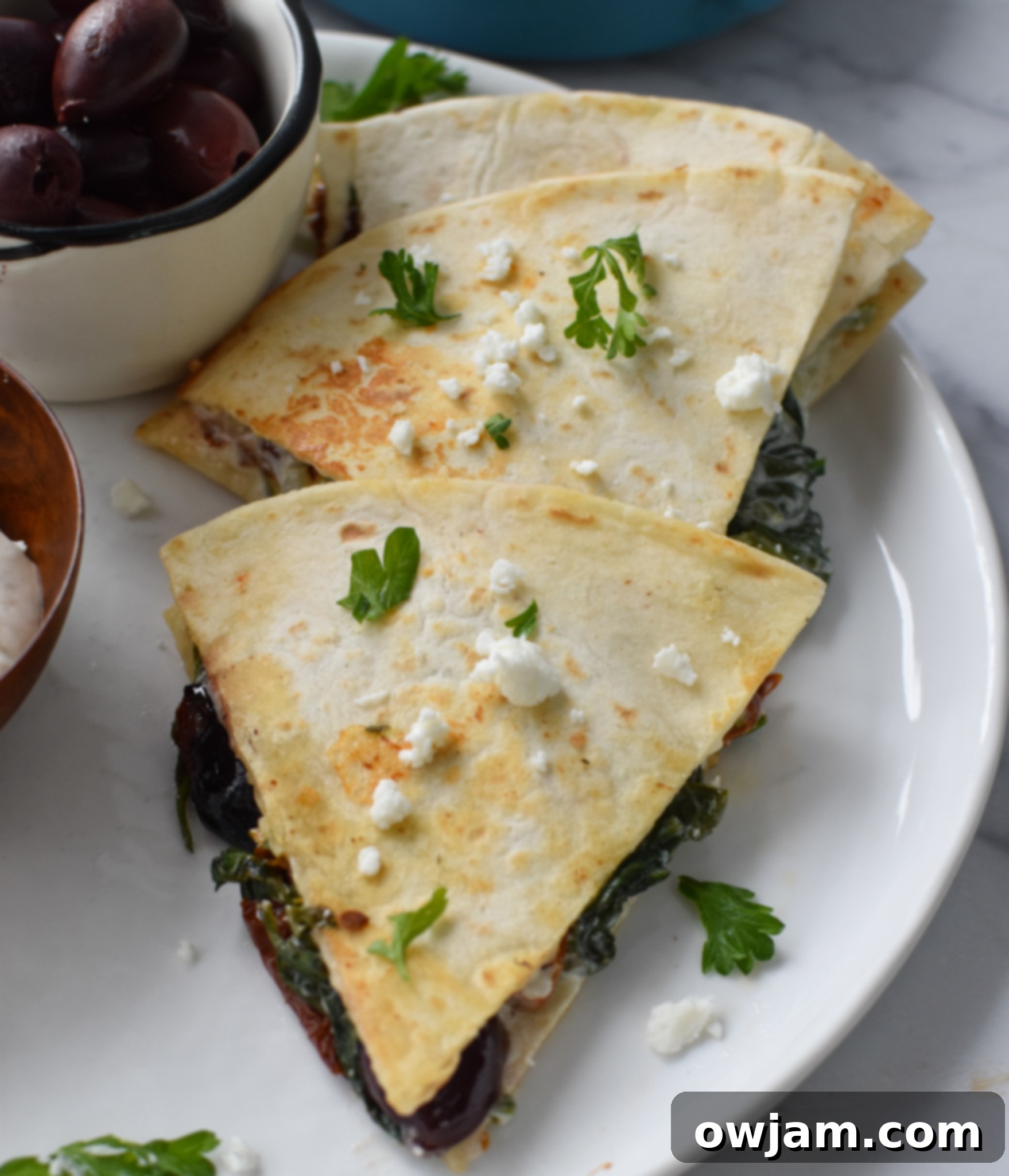 Easy Cheesy Veggie Quesadillas 7 Easy Vegetarian Quesadilla Recipe showing the feta cheese inside.