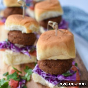 Falafel Sliders with Tangy Tahini Slaw 7 A perfectly assembled falafel slider ready to eat.