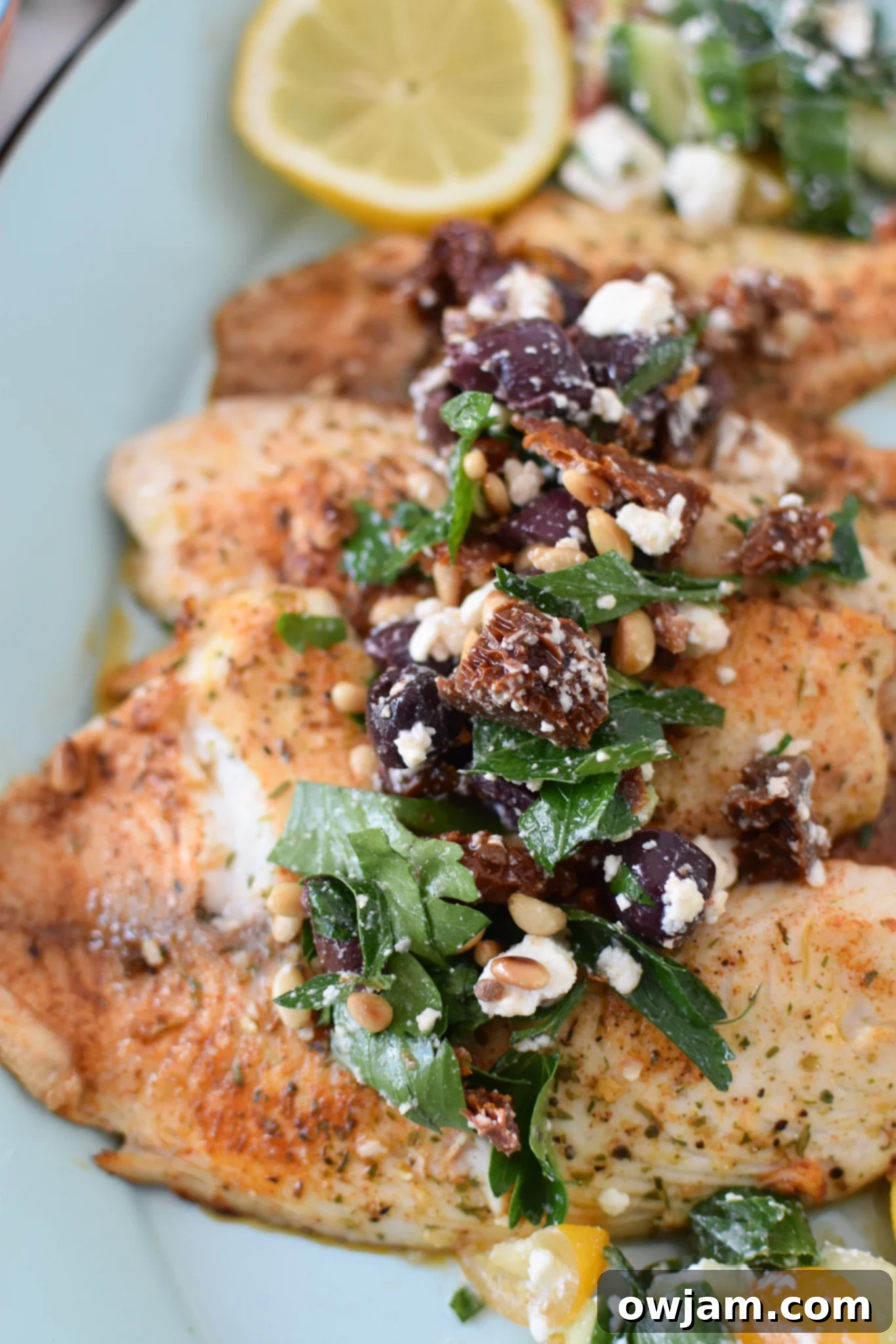Greek Baked Tilapia with olive tapenade.