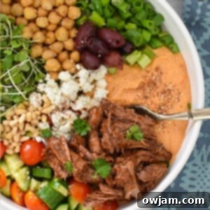 Mediterranean Shredded Beef Hummus Bowls 8 Slow Cooker Shredded Beef Hummus Bowls recipe image.