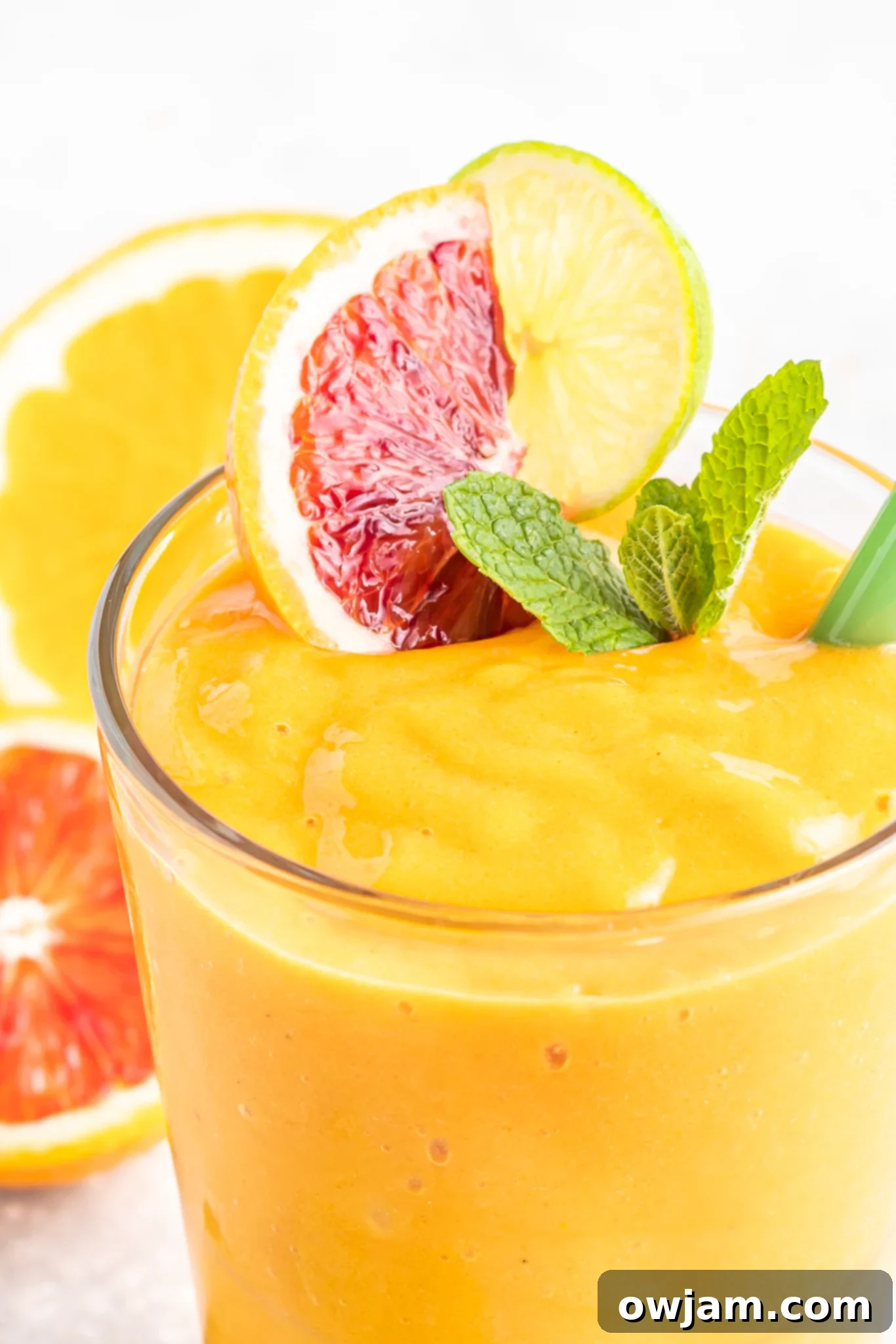 Orange Smoothie in a glass, a vibrant and refreshing blend.