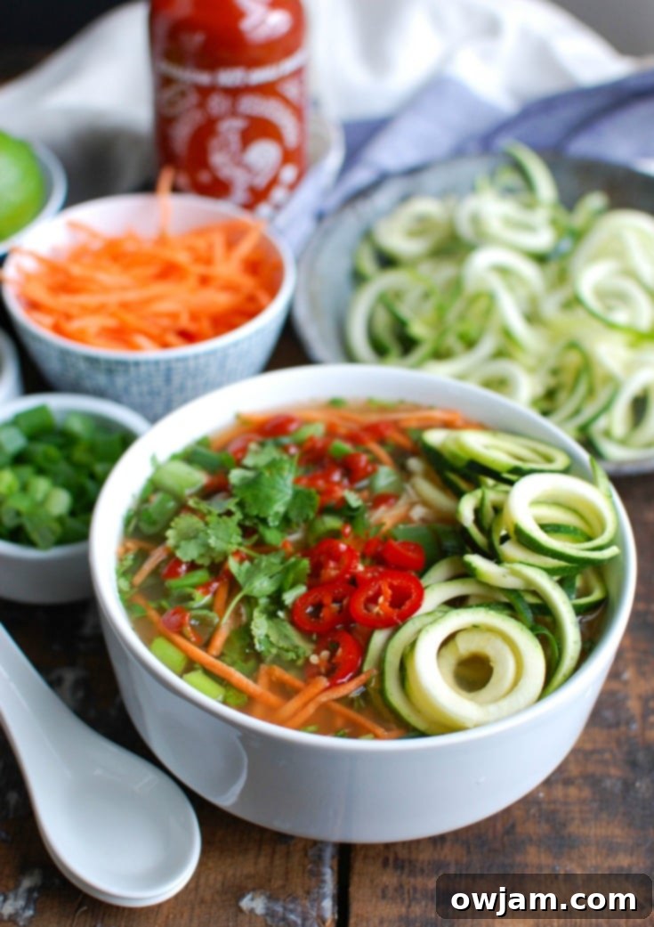 Invigorating Spicy Chicken Soup with fresh herbs in a bowl