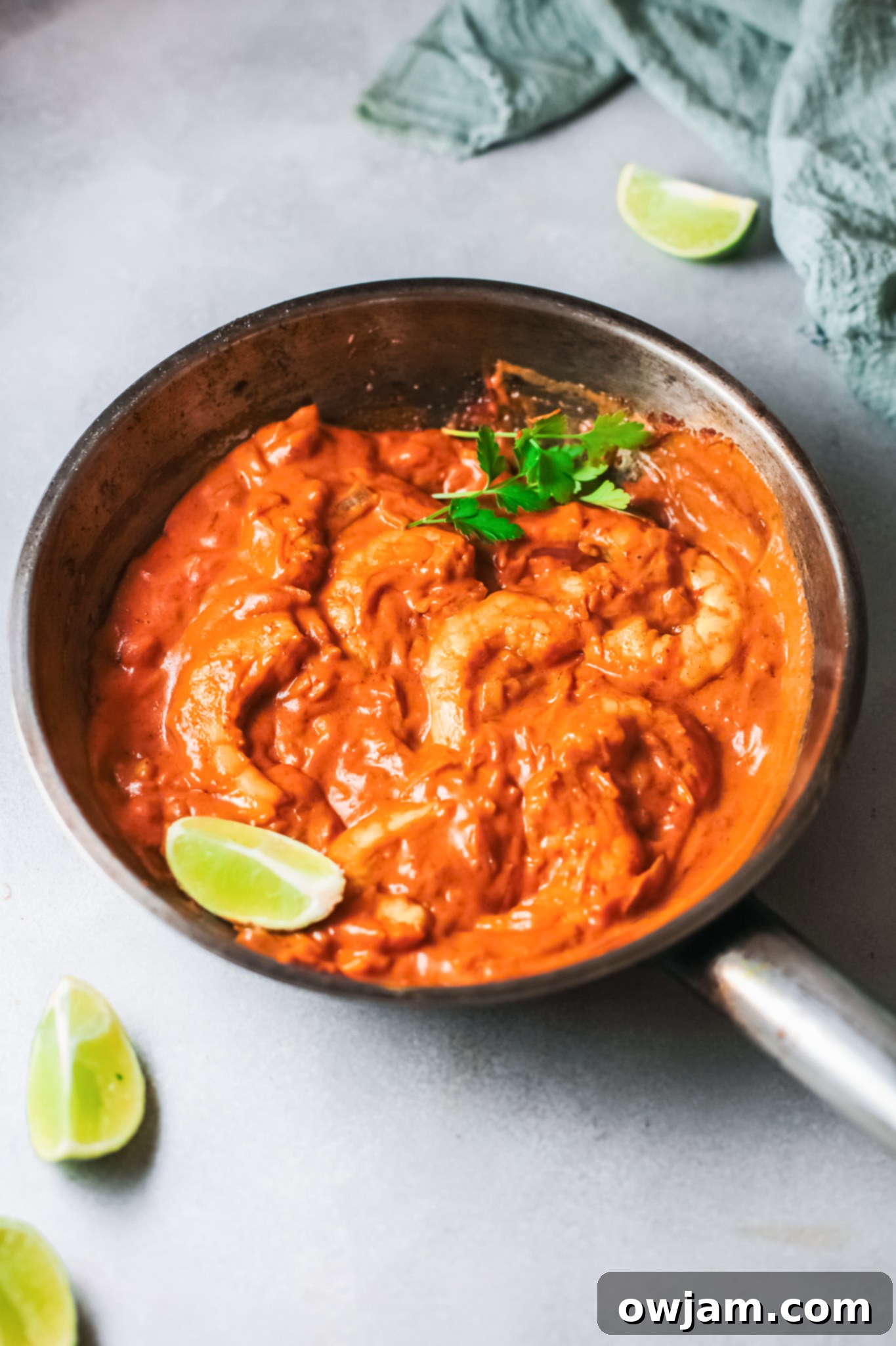 Go-To Shrimp Curry 5 Easy Shrimp Curry Recipe showing shrimp searing in a skillet.