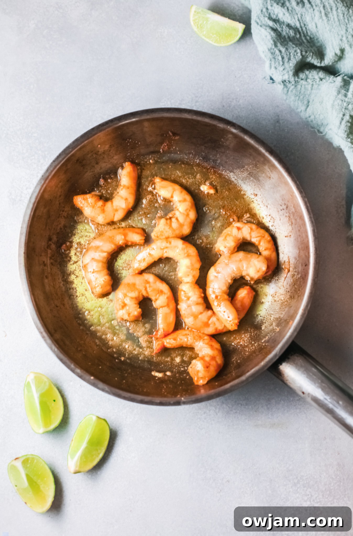 Go-To Shrimp Curry 6 Easy Shrimp Curry Recipe showing sautéed shrimp in a skillet.