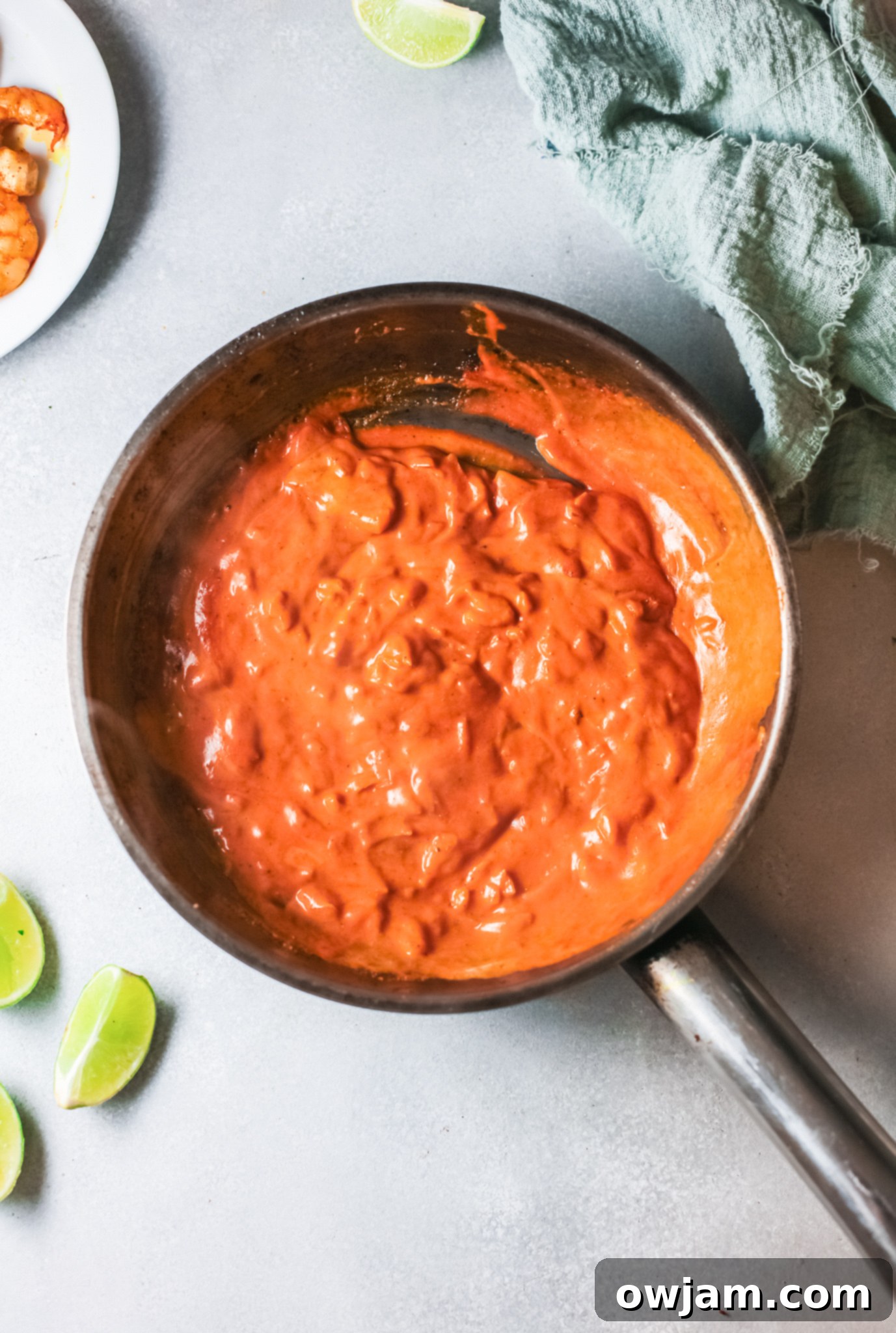 Go-To Shrimp Curry 8 Easy Shrimp Curry Recipe with sauce in a skillet.