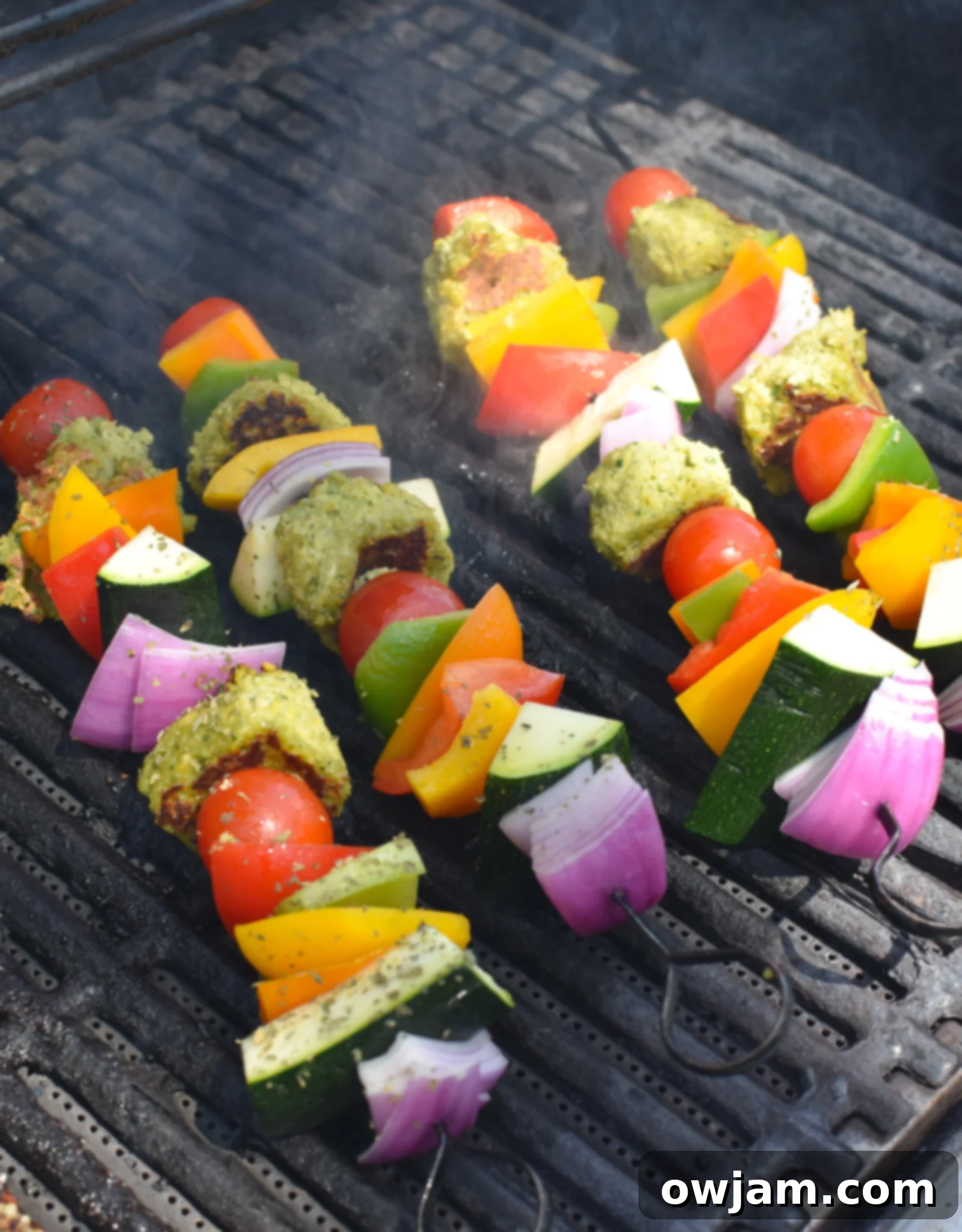 Falafel Vegetable Kabobs falafel kabobs on the grill. 