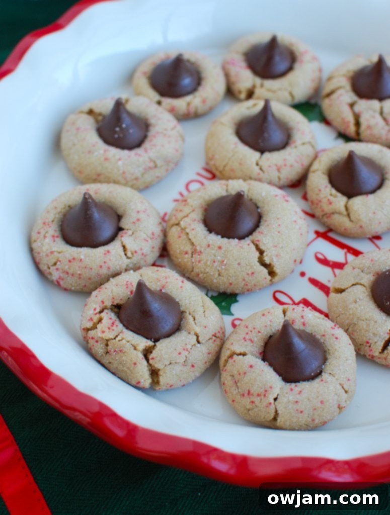 Peanut Butter Blossom Cookies on white and red plate