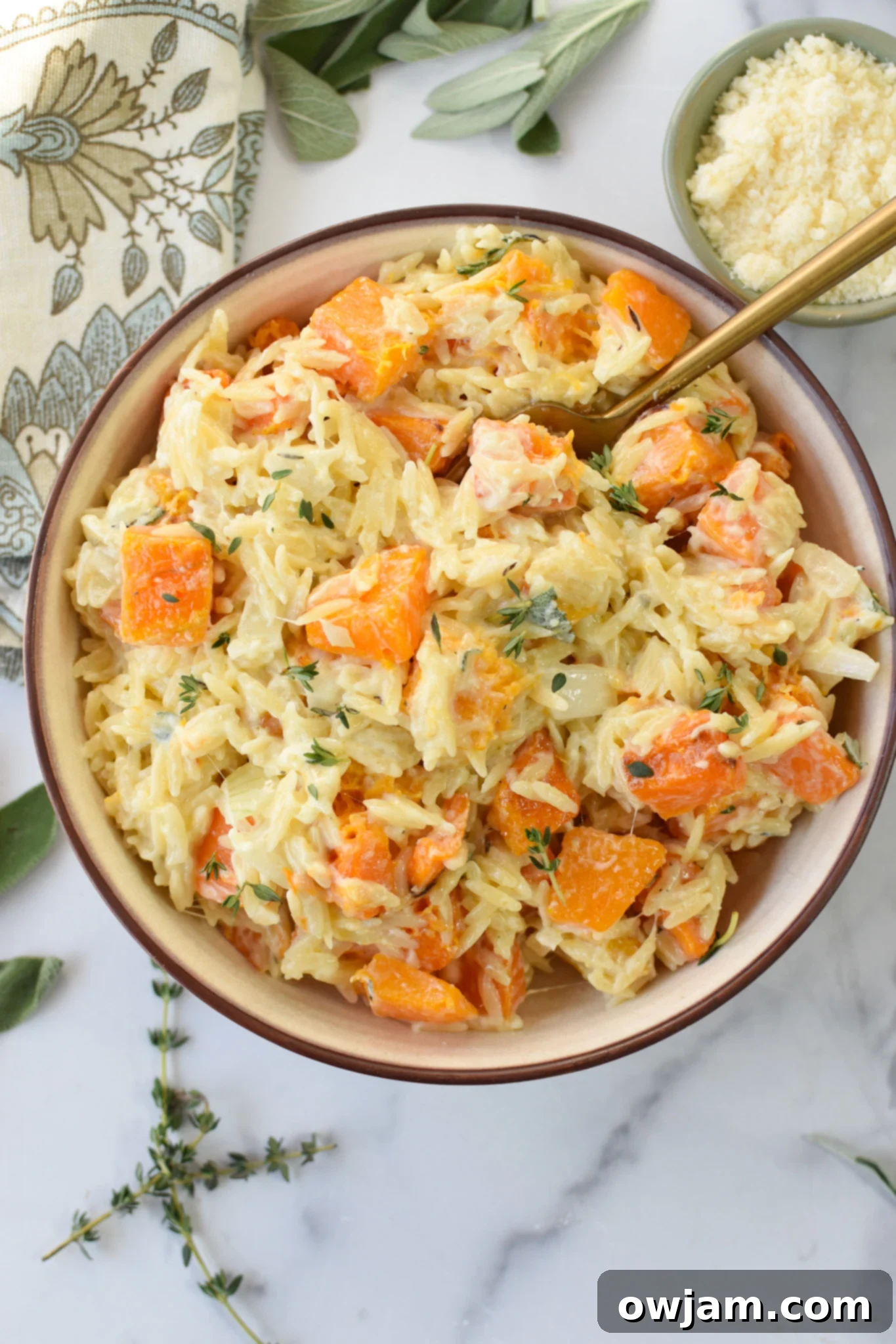Golden Cheesy Butternut Squash Orzo 4 Cheesy Butternut Squash Orzo with spoon.