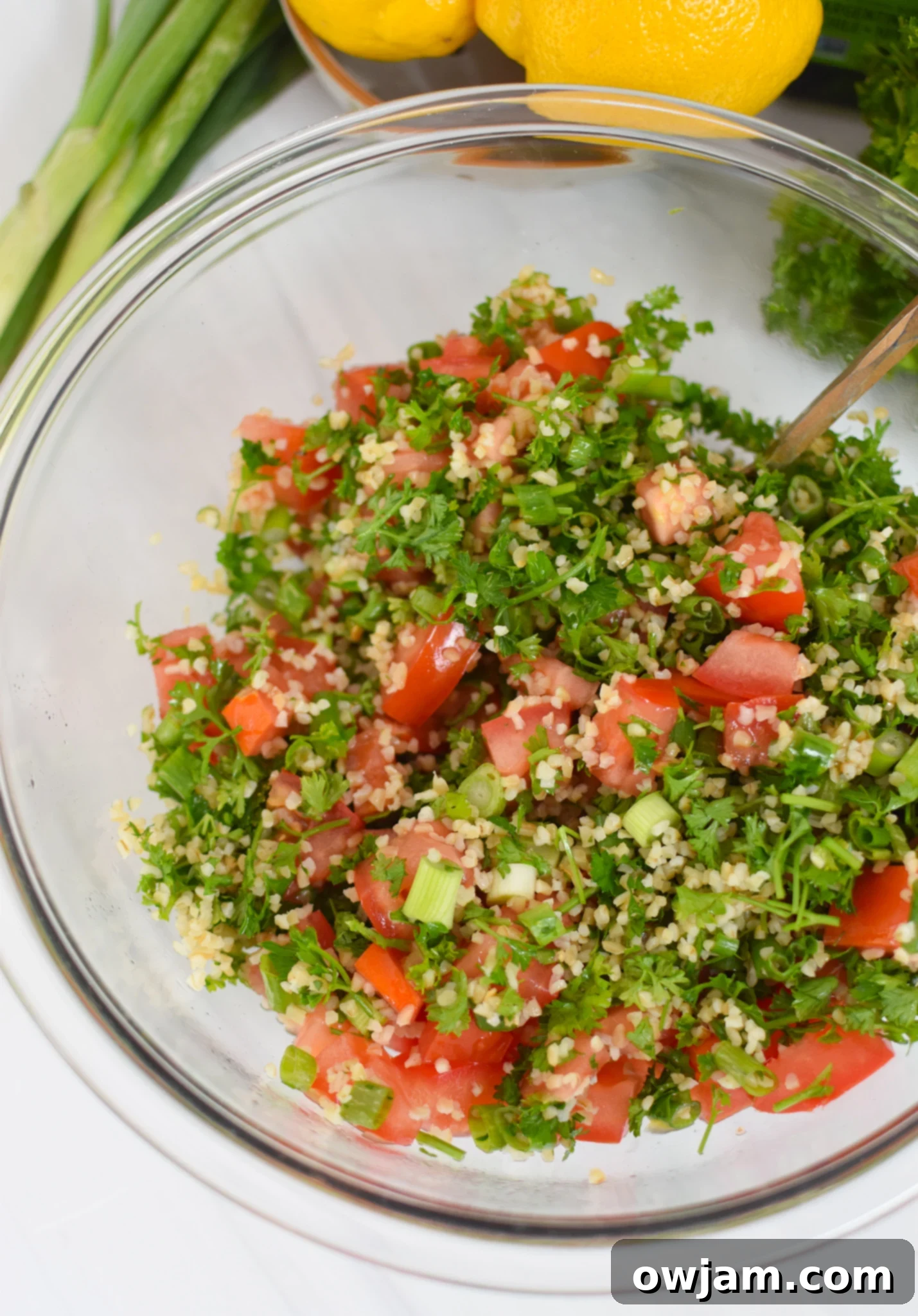 Zesty Tabbouleh Stuffed Peppers 7 Vegan Stuffed Peppers Recipe with a bowl of freshly prepared tabbouleh.