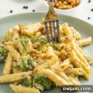 Creamy Broccoli Pasta Recipe with a fork.