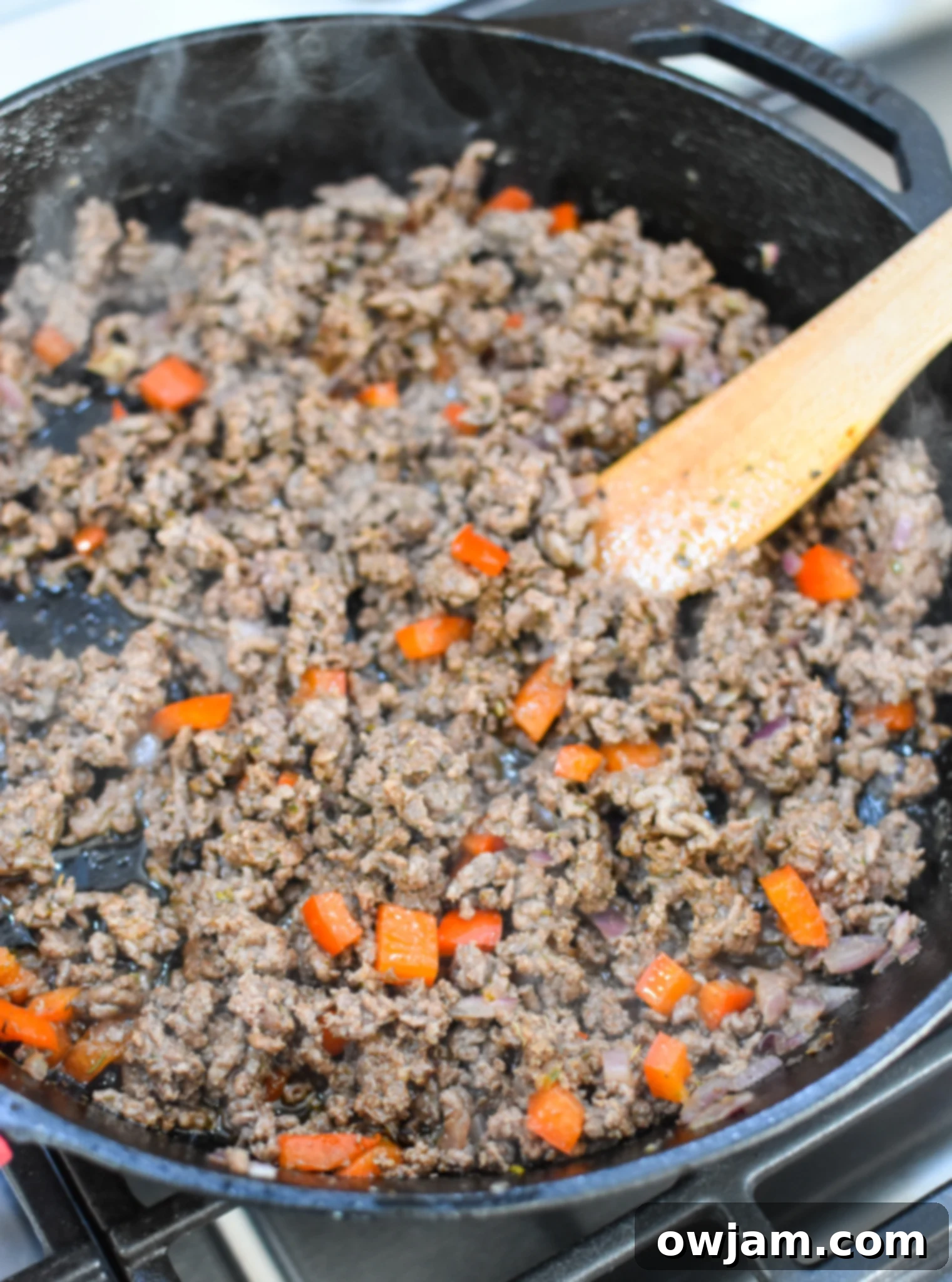 Mediterranean Ground Beef Zucchini Skillet beef cooking.