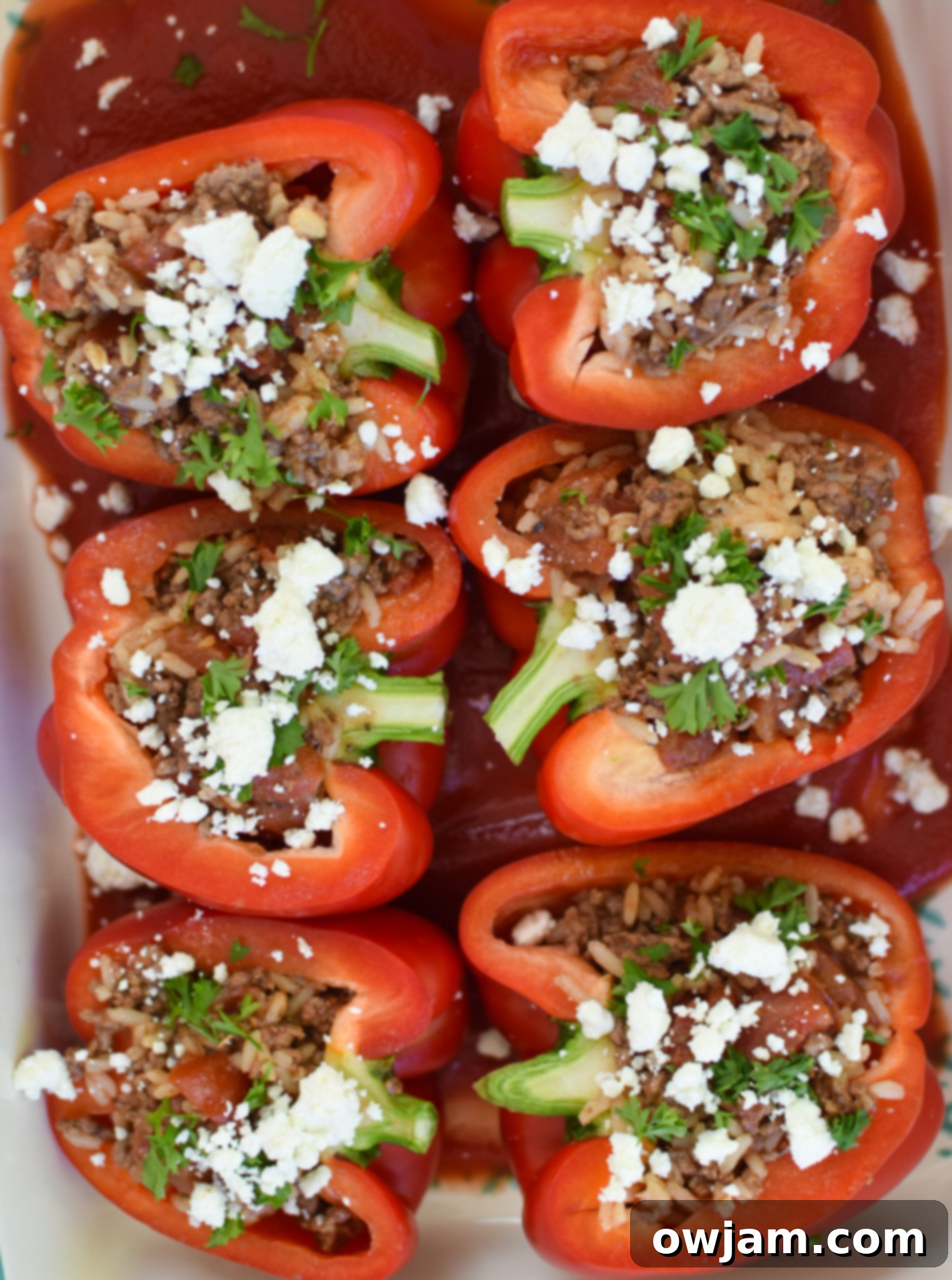 Mediterranean Ground Beef Stuffed Peppers in a baking dish.