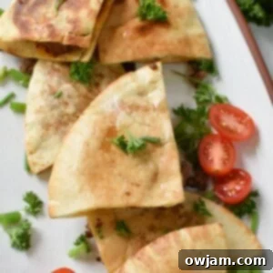 Arayes Lebanese Grilled Meat Stuffed Pitas 9 Arayes (Lebanese Meat Stuffed Pitas) - a delicious Middle Eastern street food with savory ground beef and crispy pita bread.