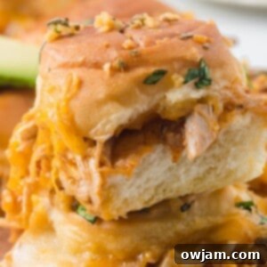 Irresistible Chicken Enchilada Sliders 13 Close-up of baked Chicken Enchilada Sliders.
