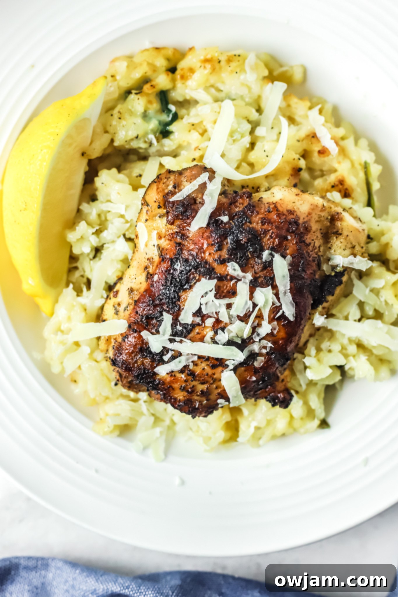 Oven Baked Chicken Thighs with Risotto with parmesan cheese. 