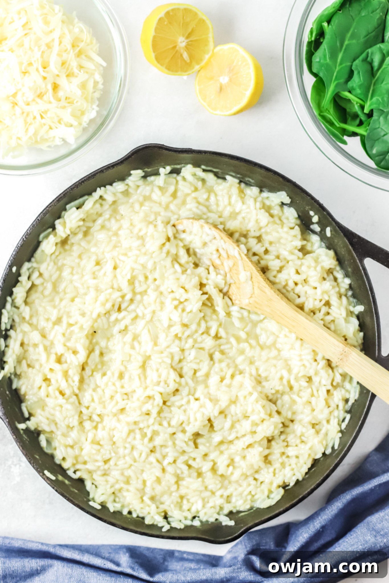 Oven Baked Chicken Thighs with Risotto risotto in a skillet. 