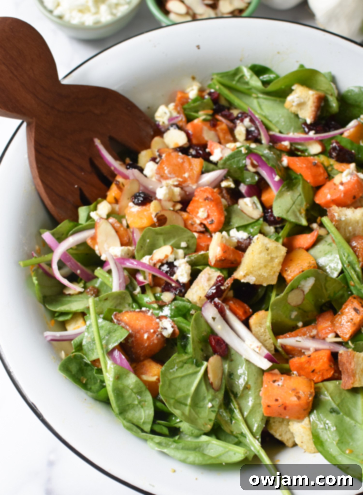 Roasted Vegetable Salad in a white bowl. 