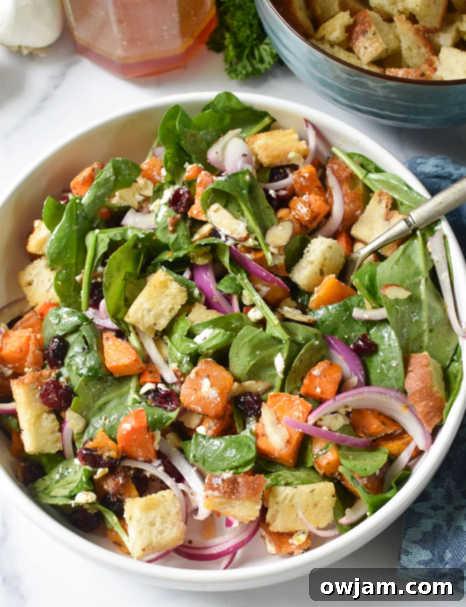 Roasted Vegetable Salad in a white bowl. 