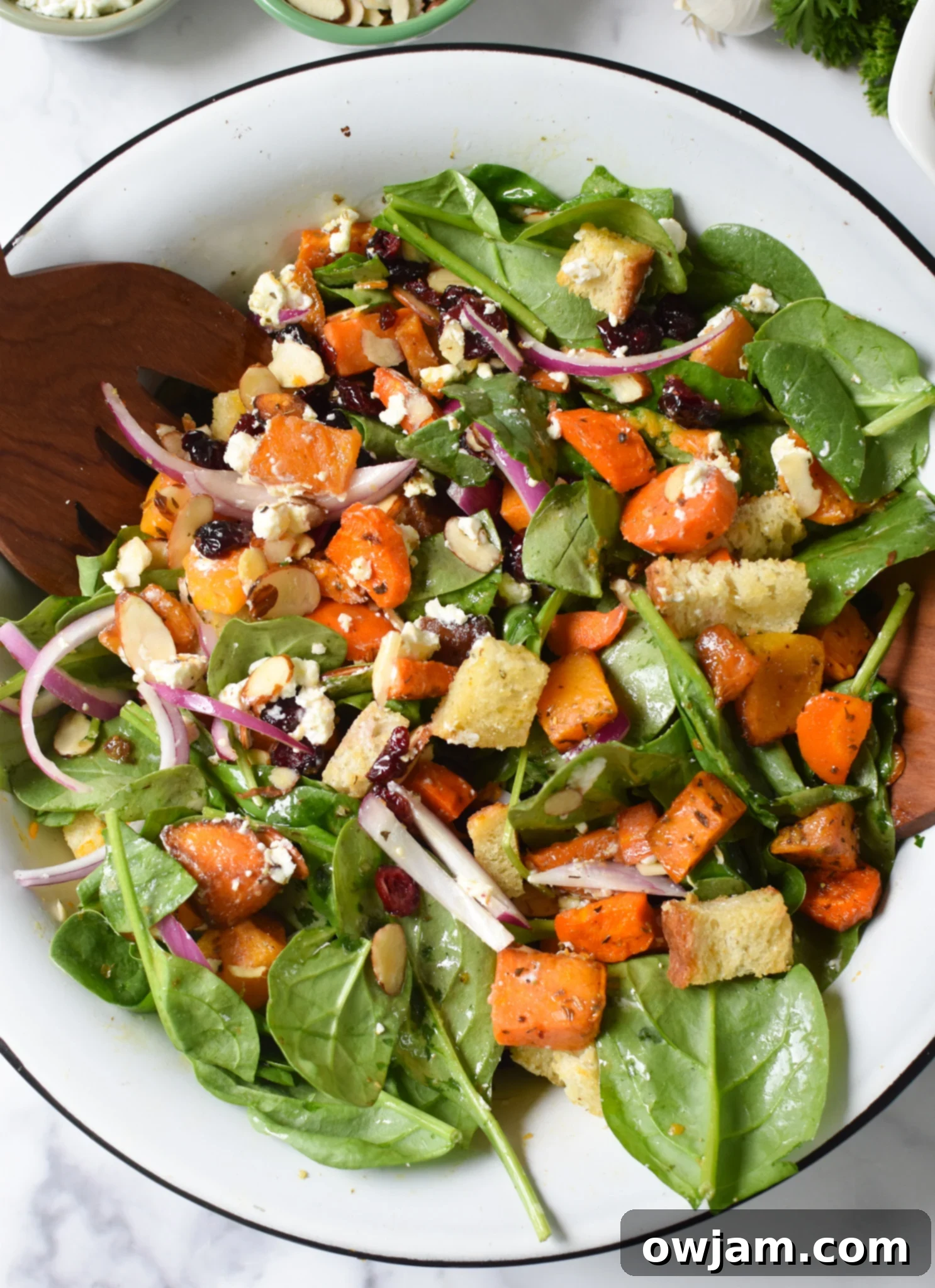 Roasted Vegetable Salad in a white bowl. 