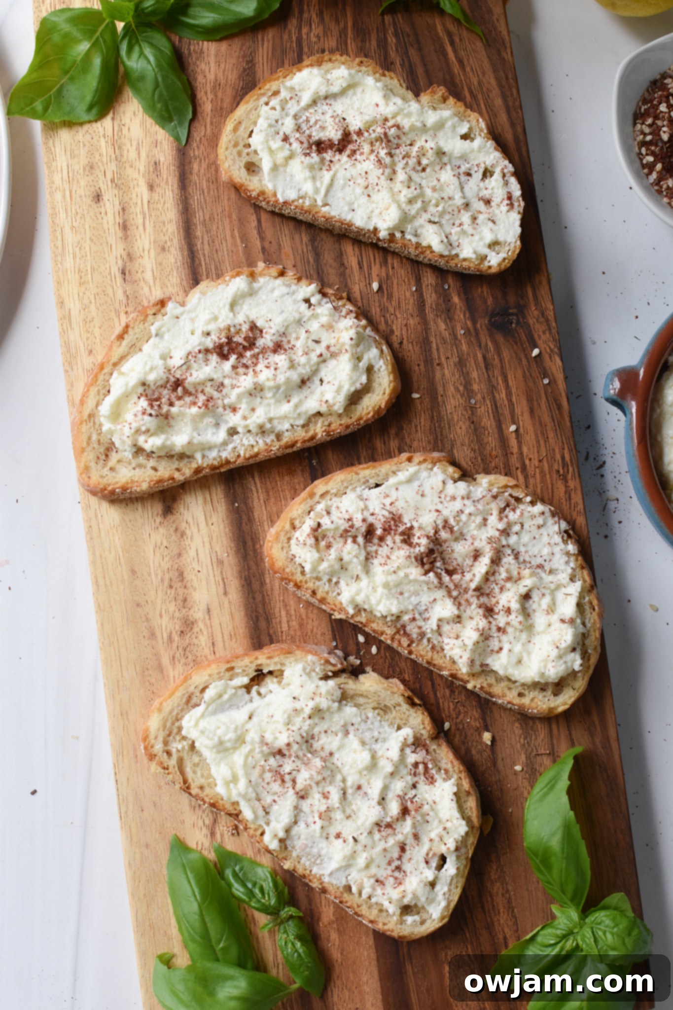 Creamy Feta Tomato Toast 6 Tomato Toast with Whipped Feta whipped feta on bread.
