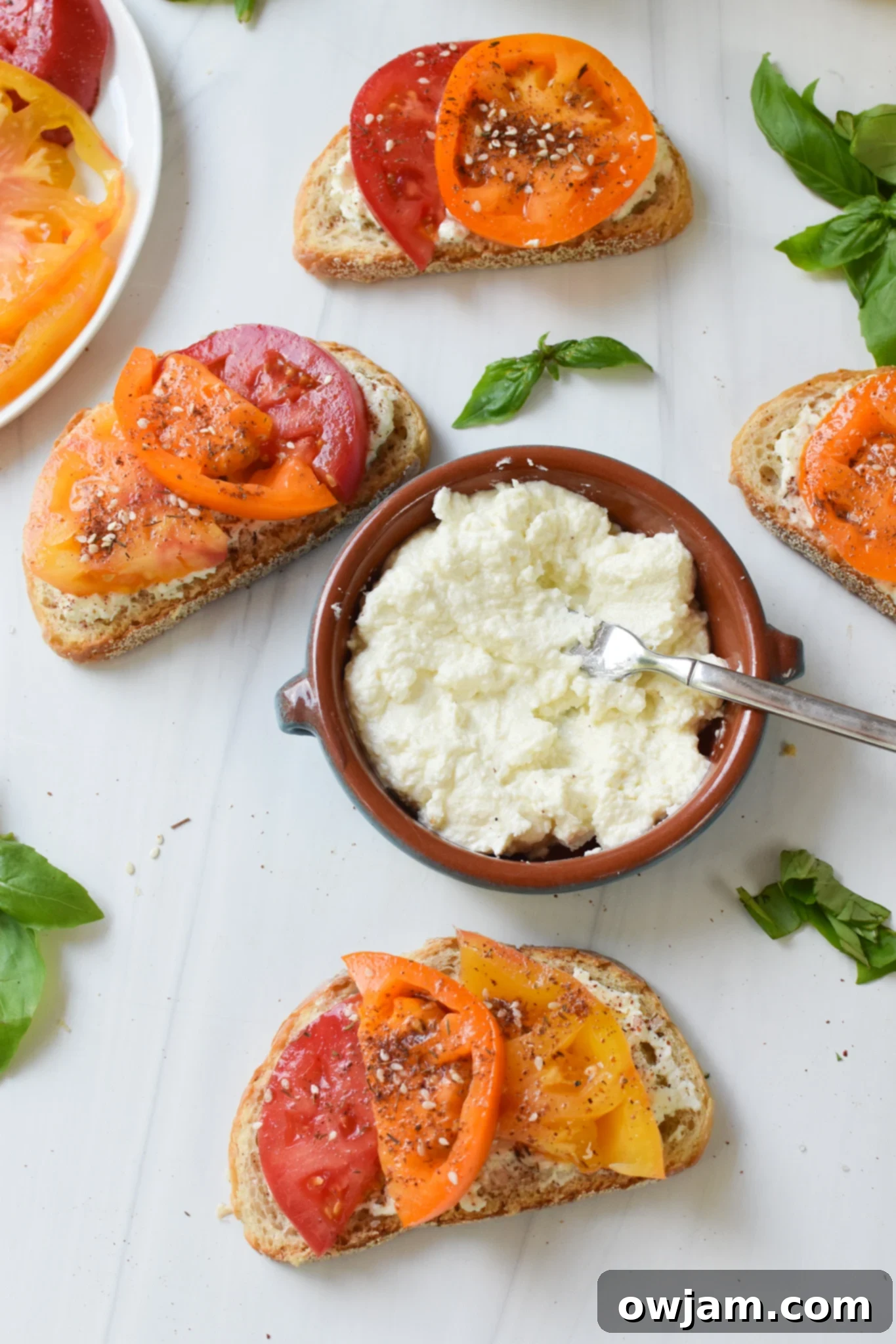 Creamy Feta Tomato Toast 8 Tomato Toast with Whipped Feta with feta in the middle.