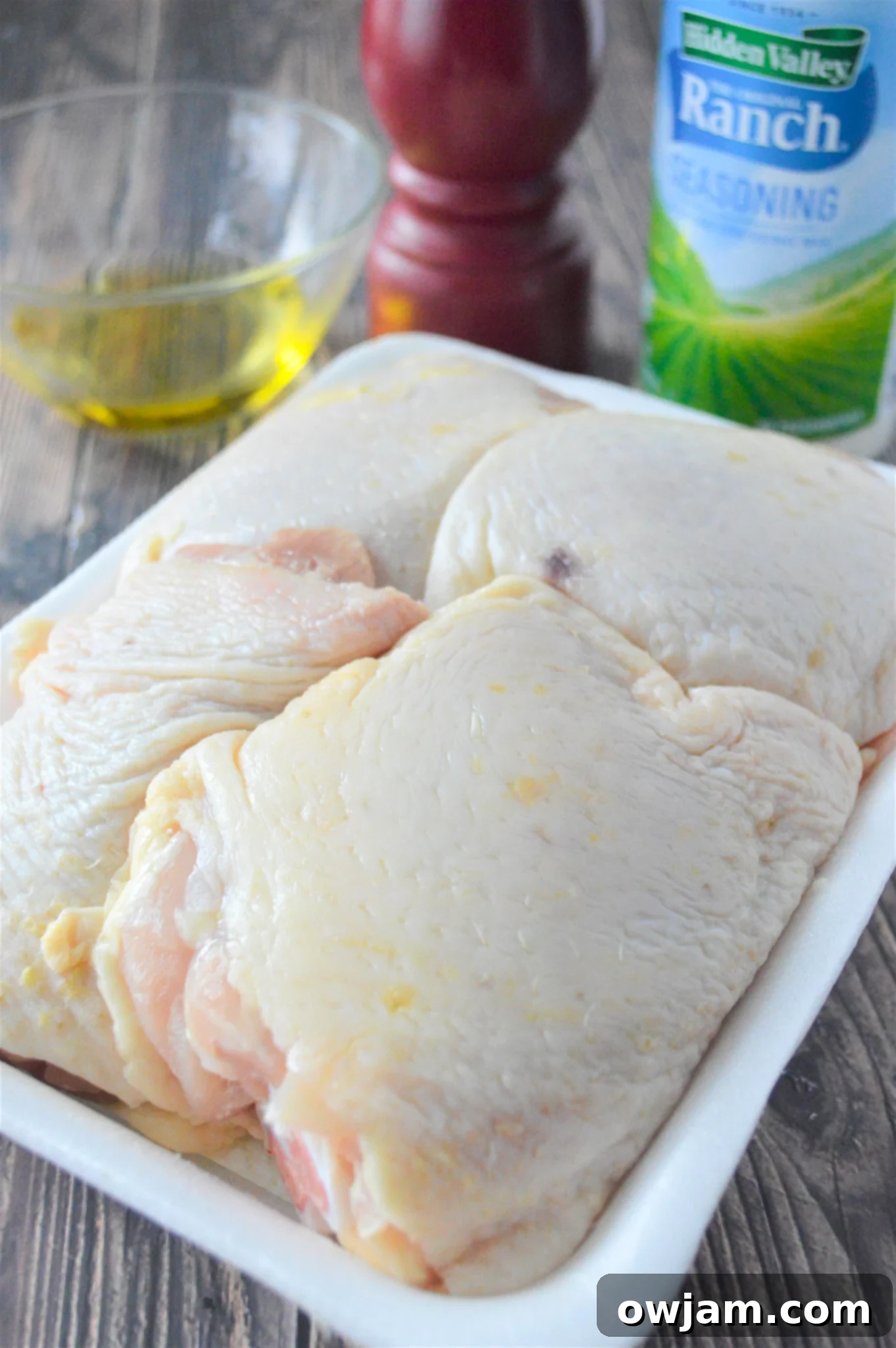 Zesty Ranch Chicken Thighs 5 Oven Baked Ranch Chicken Thighs chicken in a dish.